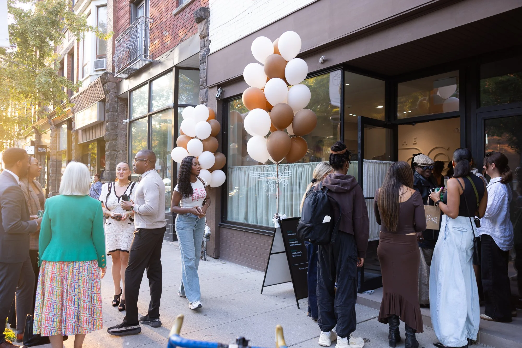 Guests gathering outside The Face Lab clinic in Toronto for an open house event