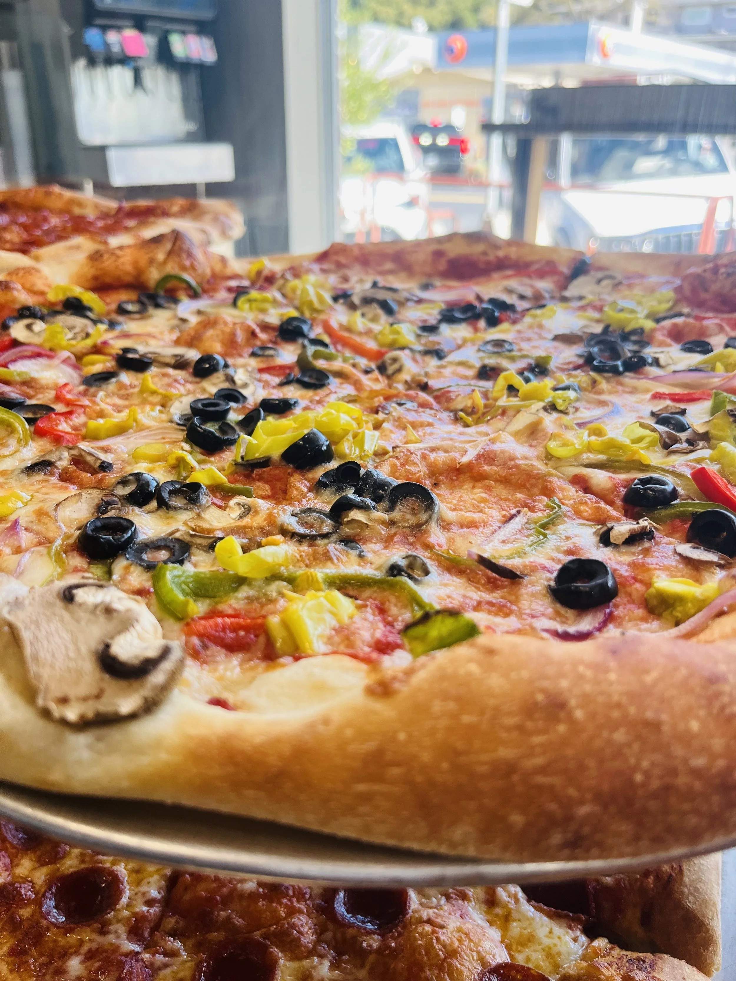 One of the 8Moose speciality pizzas, an all veggie with bell peppers, olives, onions, mushrooms and pepperoncinis for an extra kick. 