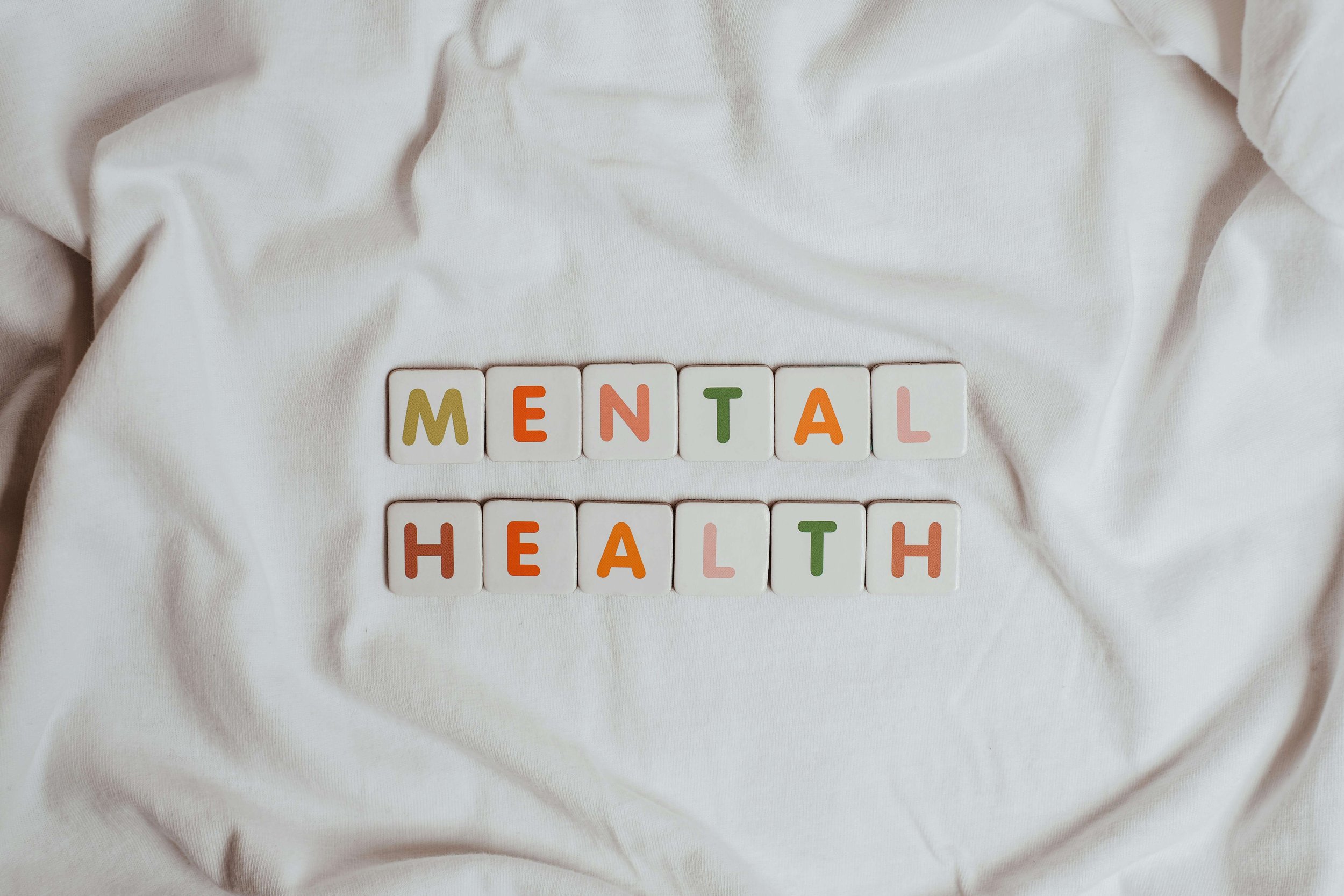 Colorful letter tiles spelling "Mental Health.” Want to prioritize your mental health & give your relationships the fresh start they deserve this spring? Relationship therapy in Davie, FL offers the support you need to clear the clutter & reconnect.