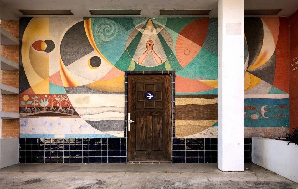 Commissioned by University Baptist Church in Austin, Texas, known as "Creation" or "Genesis", is considered to be the first mural in the city. Positioned above the church entrance, the abstract fresco features swirling orbs and concentric forms symbo