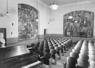 Pictured in black and white, these two murals, entitled “Religious and Modern Music” (left) and “African Music and European Music” (right), in the Music Room of the Abraham Lincoln High School were completed in 1937. The New York Schools website show