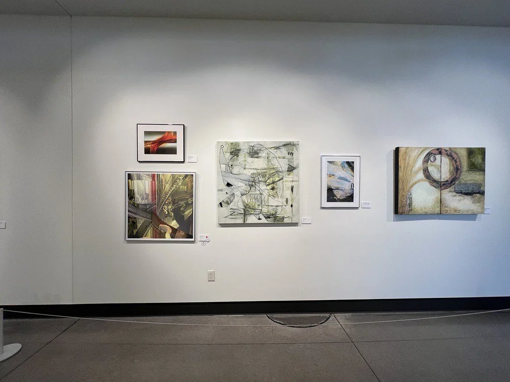 SALI Abstract Exhibition at Gallery 42 wall with five abstract and landscape paintings displayed in an art gallery.