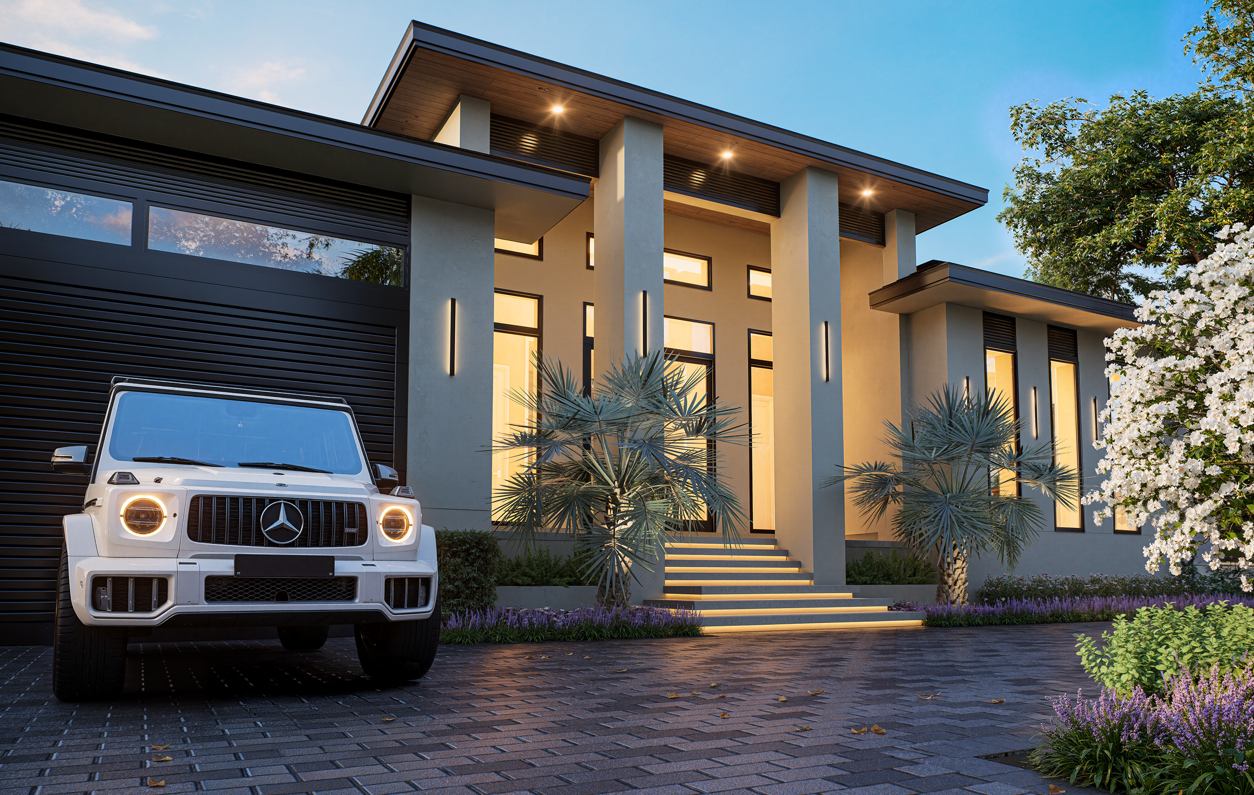 Modern house with illuminated windows, a white Mercedes-Benz G-Class SUV parked in the driveway, and landscaped plants including palms and flowering bushes, during dusk.