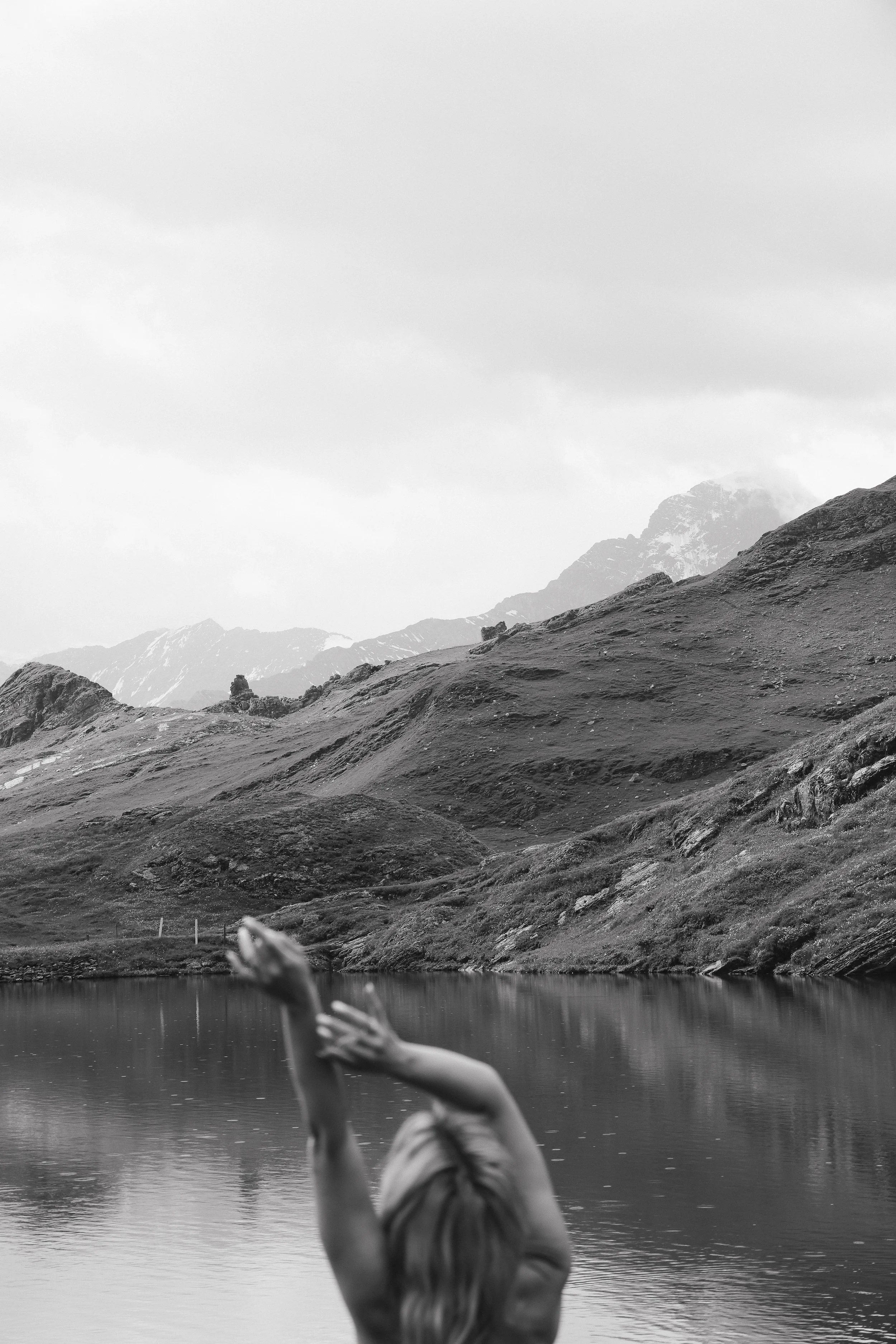 switzerland-woman-black-and-white-candid-glacier-lake-swiss-alps-sarah-fingarson-photography.jpeg-kelly-vahakan-romantic-couple-session-swiss-alps-sarah-fingarson-photography.jpg