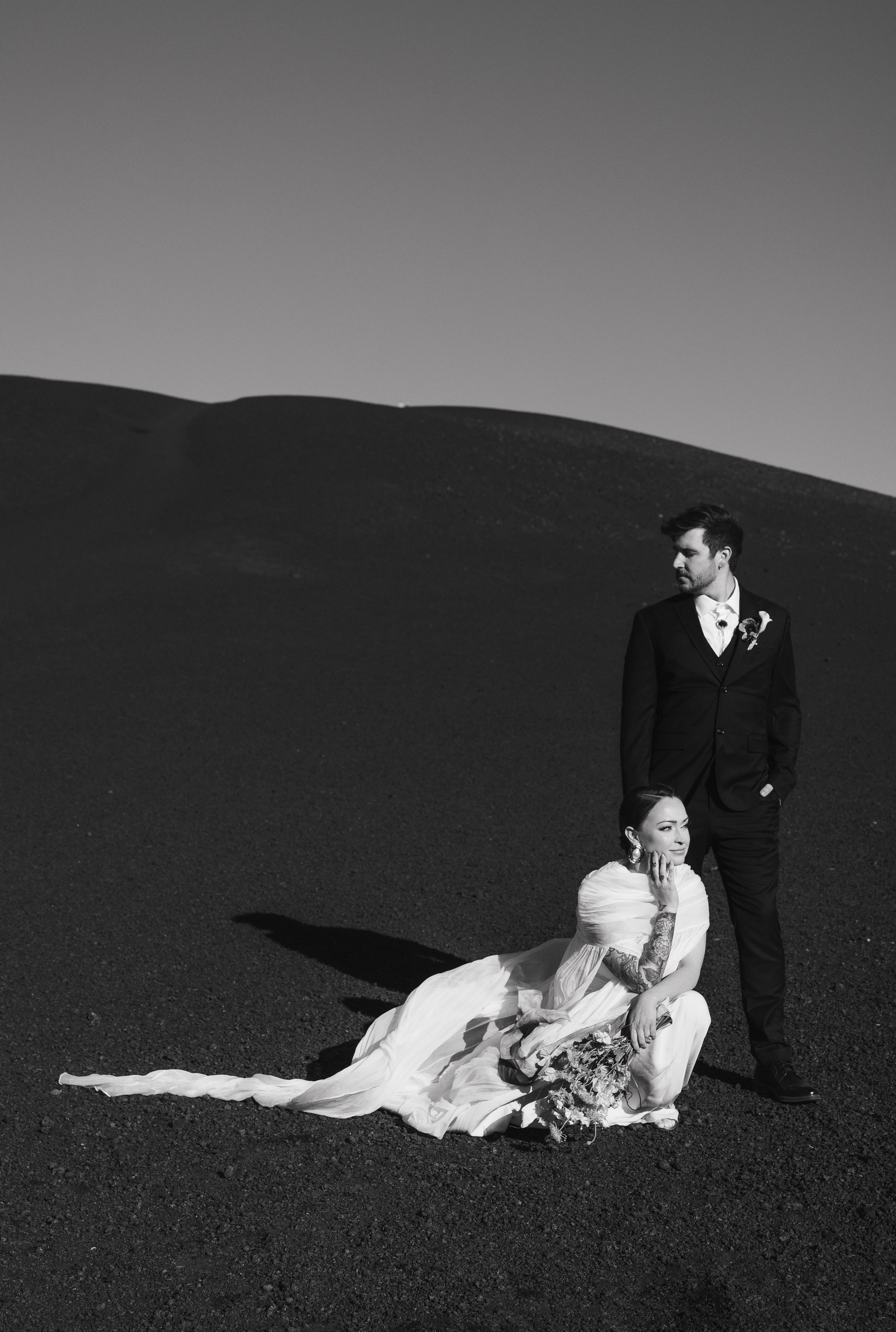 Copy of sarah-fingarson-couple-bride-groom-black-and-white-craters-of-the-moon-idaho-desert-elopement-editorial.jpg