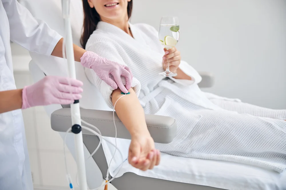 Client receiving IV therapy