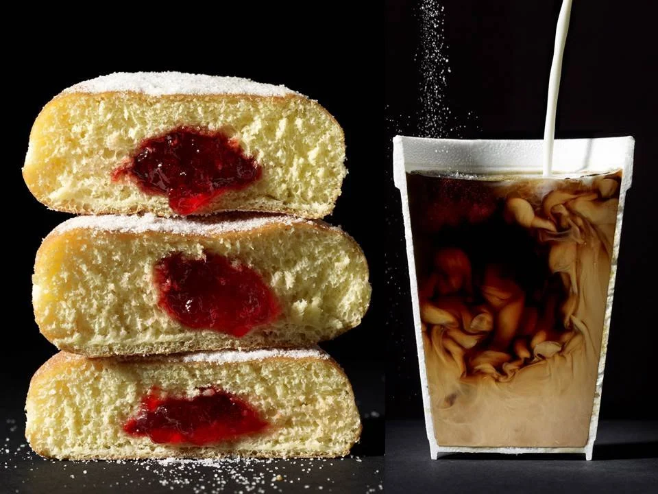 Cut in Half by Food Stylist Charlotte Omnes & Photographer Beth Galton-Stacked jelly-filled donuts with sugar and iced coffee with cream being poured