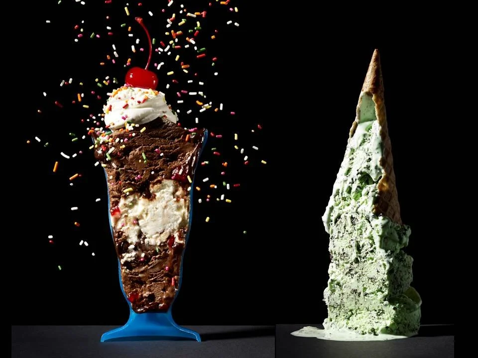 Cut in Half by Food Stylist Charlotte Omnes & Photographer Beth Galton-A chocolate ice cream sundae with sprinkles, whipped cream, and a cherry on one side, and a melting mint chocolate chip ice cream cone on the other.