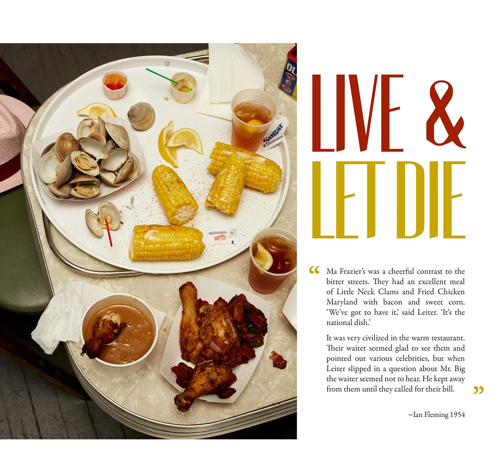 Plate with clams, corn on the cob, lemon wedges, and two cups of iced tea, alongside fried chicken legs and beans. Text on the right reads "Live & Let Die" with a quote from Ian Fleming's book discussing a meal of Little Neck Clams, Fried Chicken Maryland, bacon, and sweet corn.