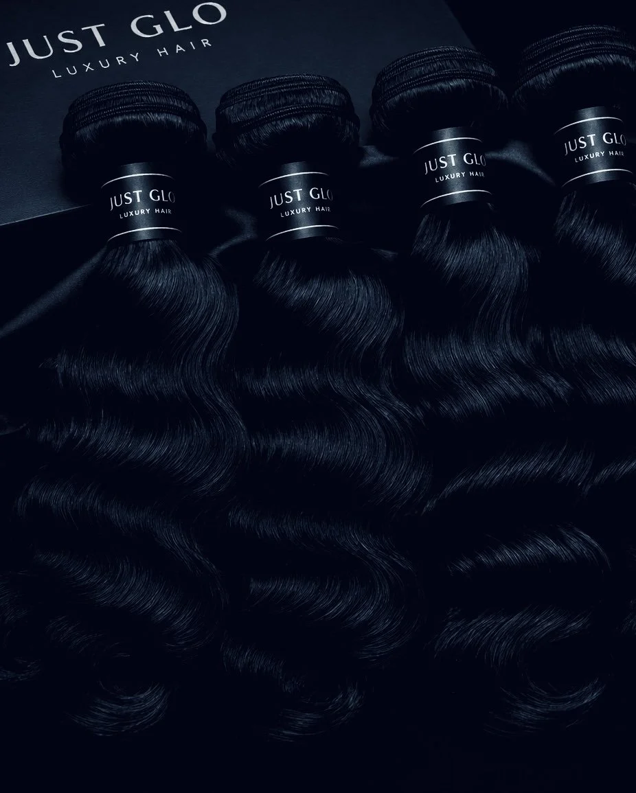 Luxury body wave hair extensions ahowcasing shine, fullness, and natural movement.