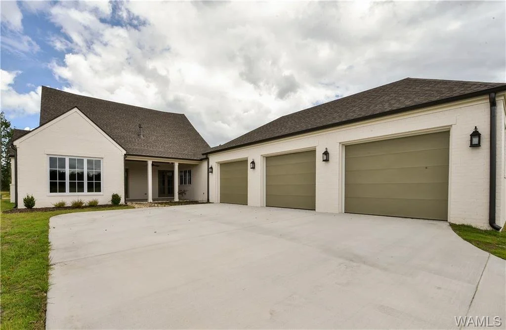 Rear exterior and 3-car garage