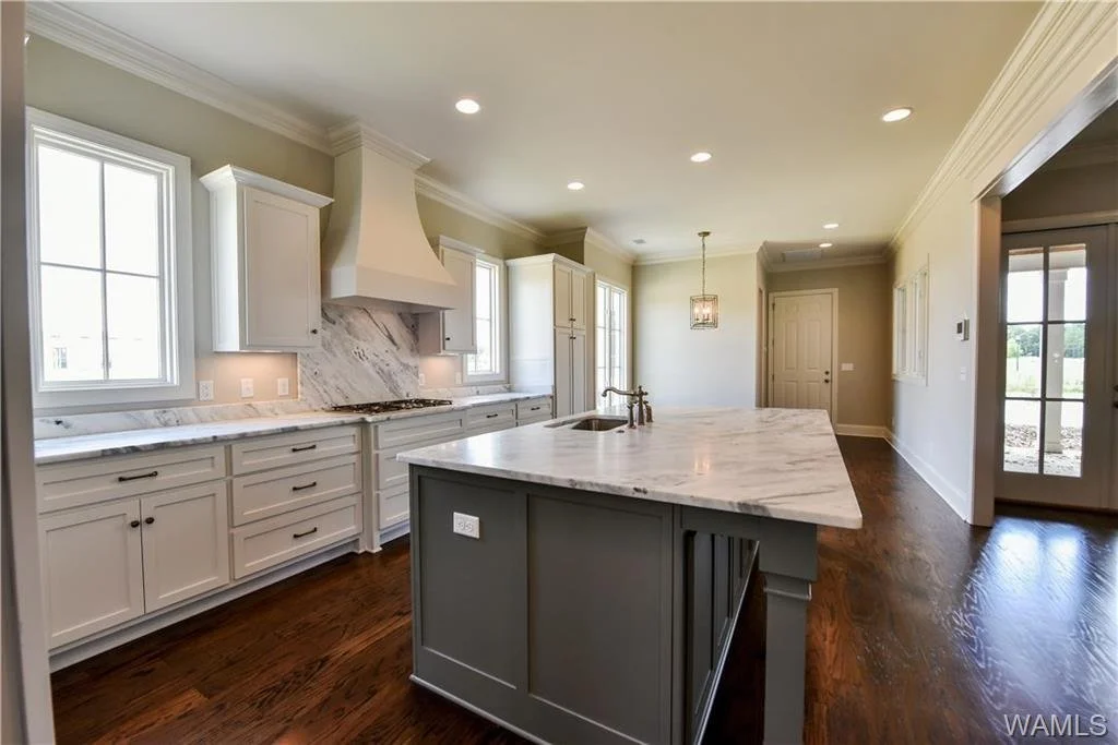Kitchen island and marble backsplash