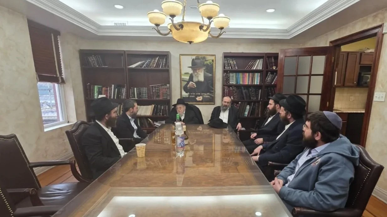 Rabbi Osdoba and Rabbi Braun meeting with members of the Vaad Hakohol