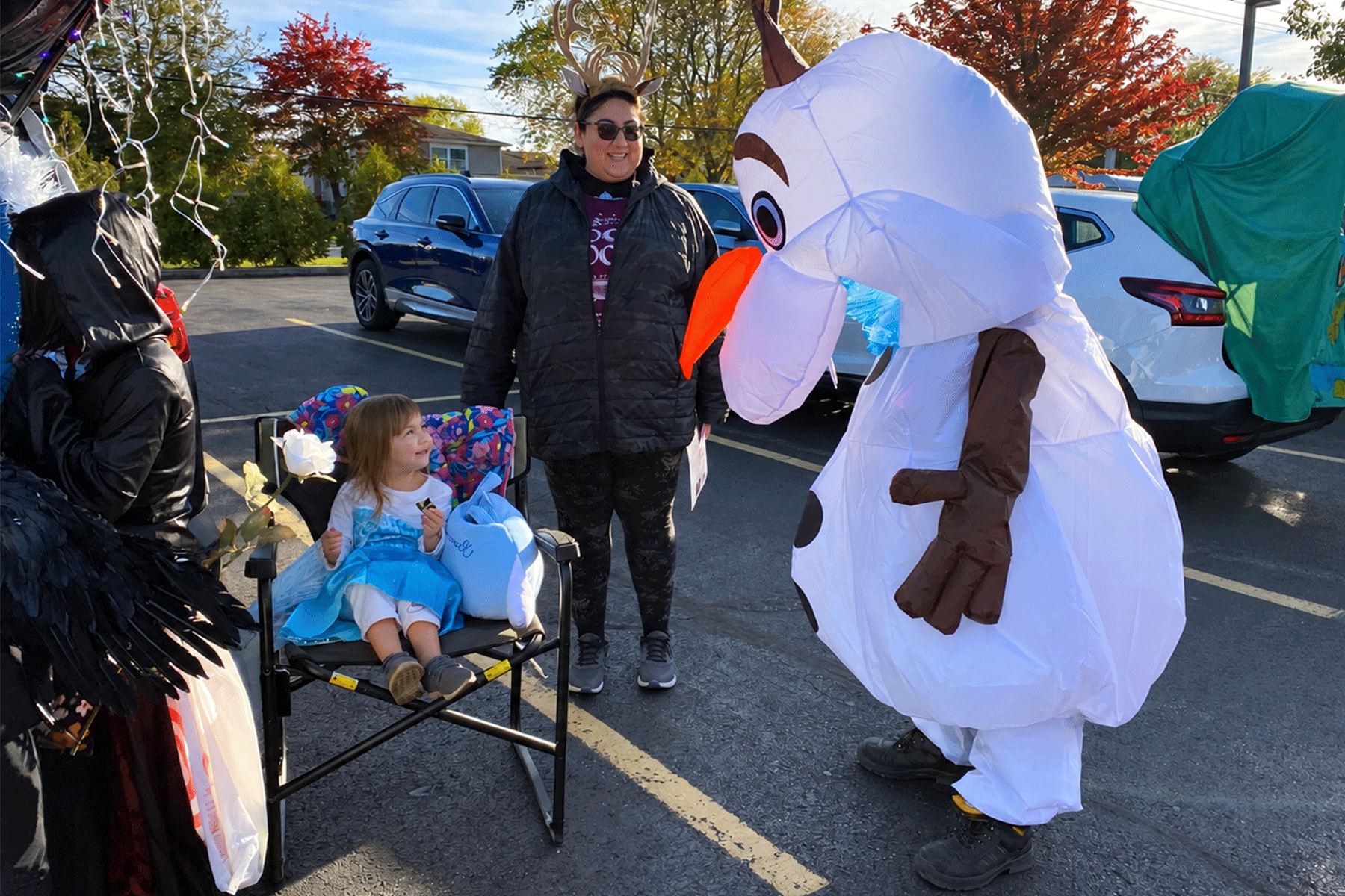 Trunk-or-Treat-blog_0000s_0011_02_a_bright_crisp_daytime_outdoor_parking_lot_hallow_2_batch_2.png