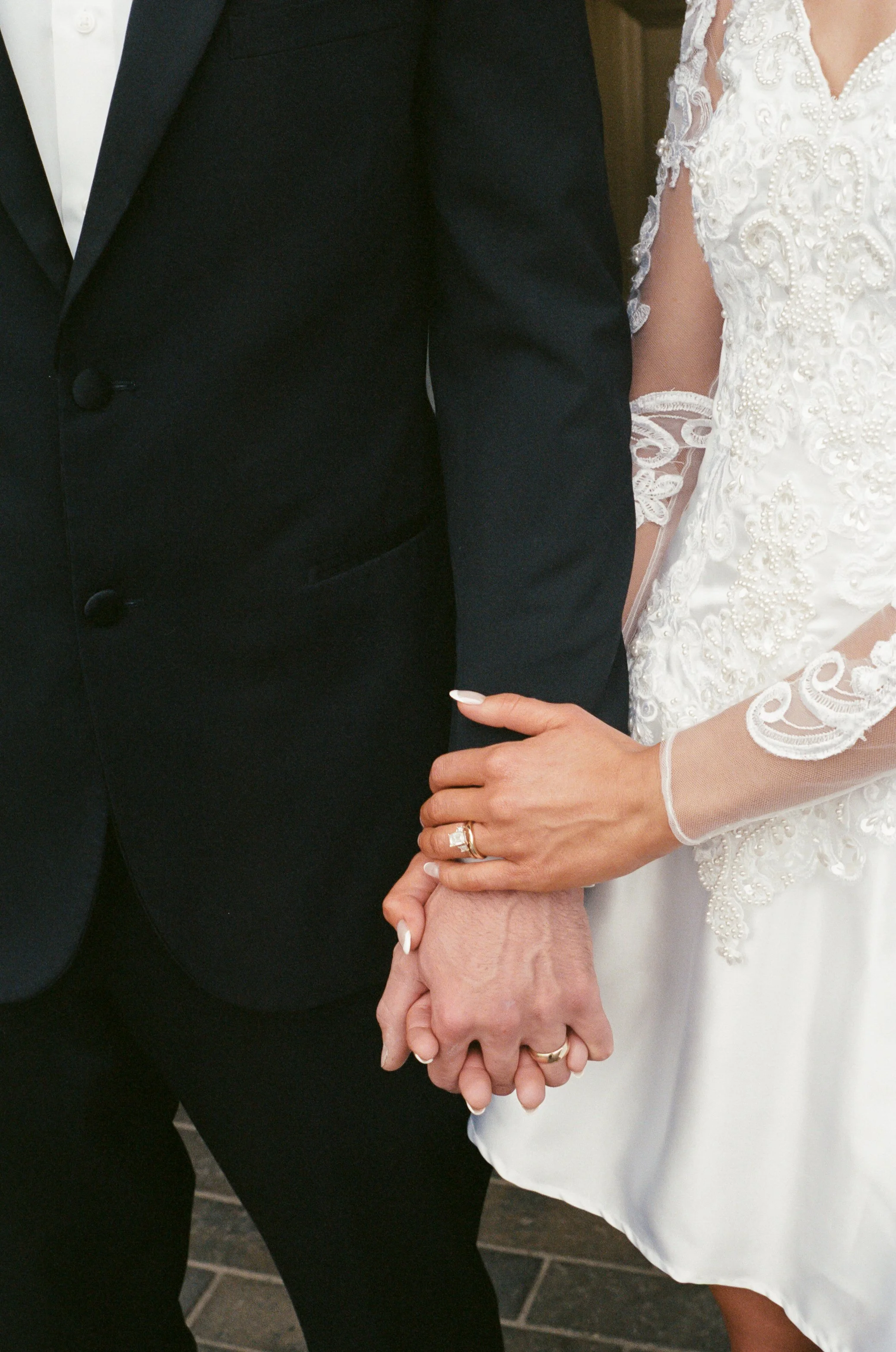 Close up ring shot of newlyweds on their elopement wedding day at the Kansas State Capitol.
