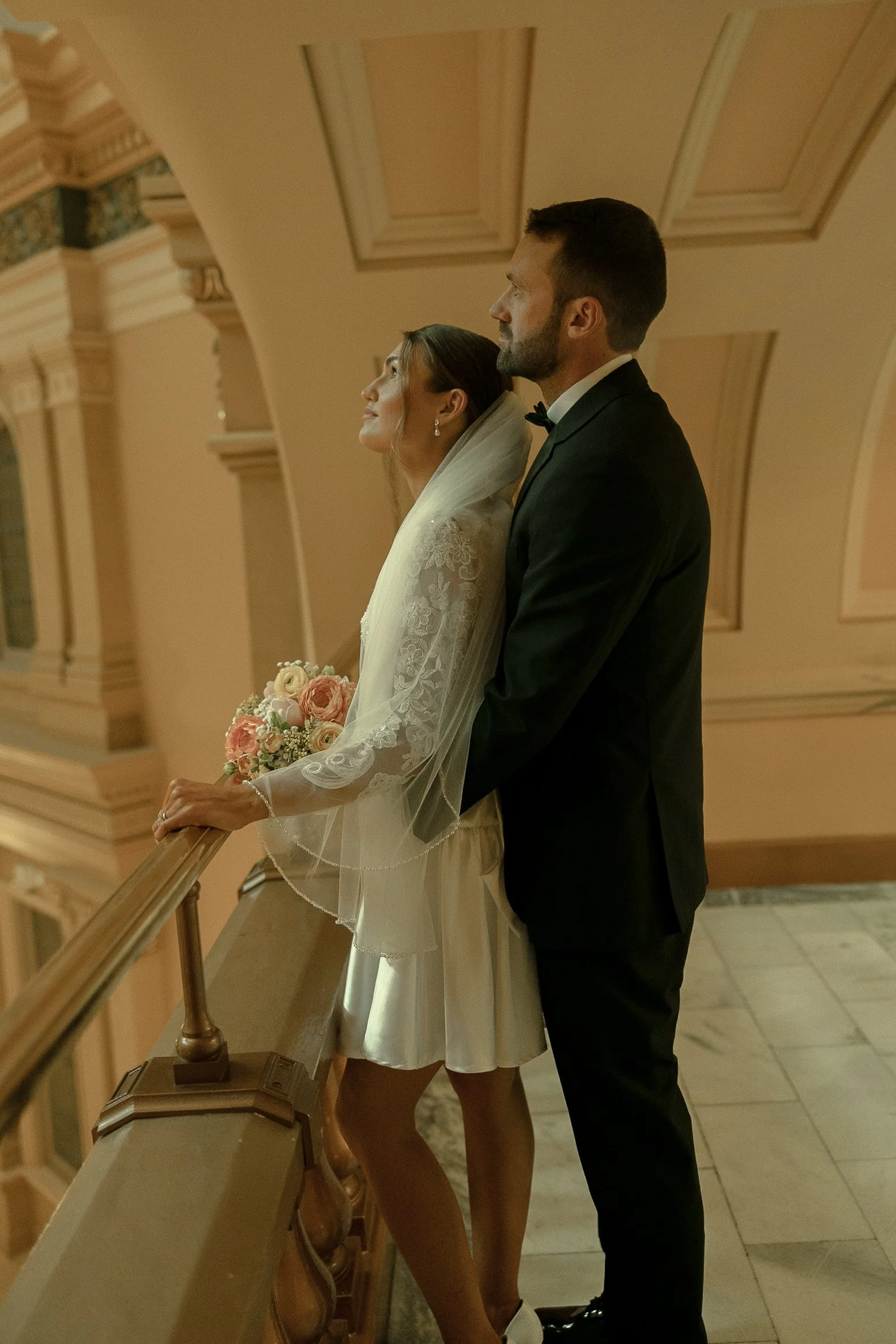 Editorial-style wedding portraits on the Capitol staircase.