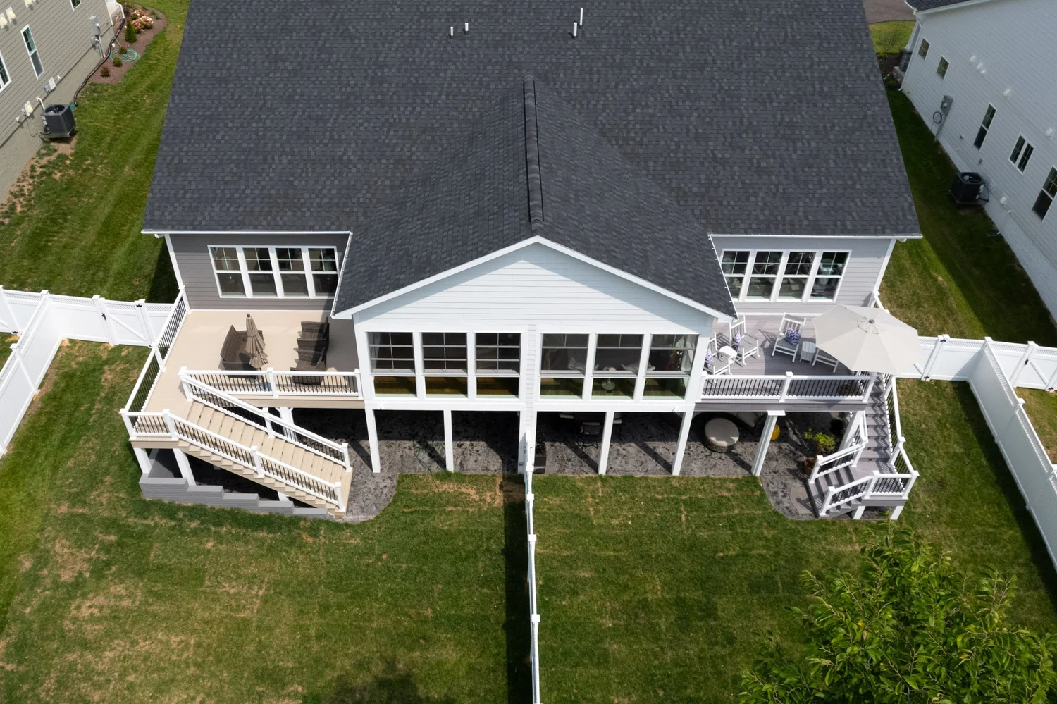 Overhead view of the duplex roofline with the two porch additions on either side