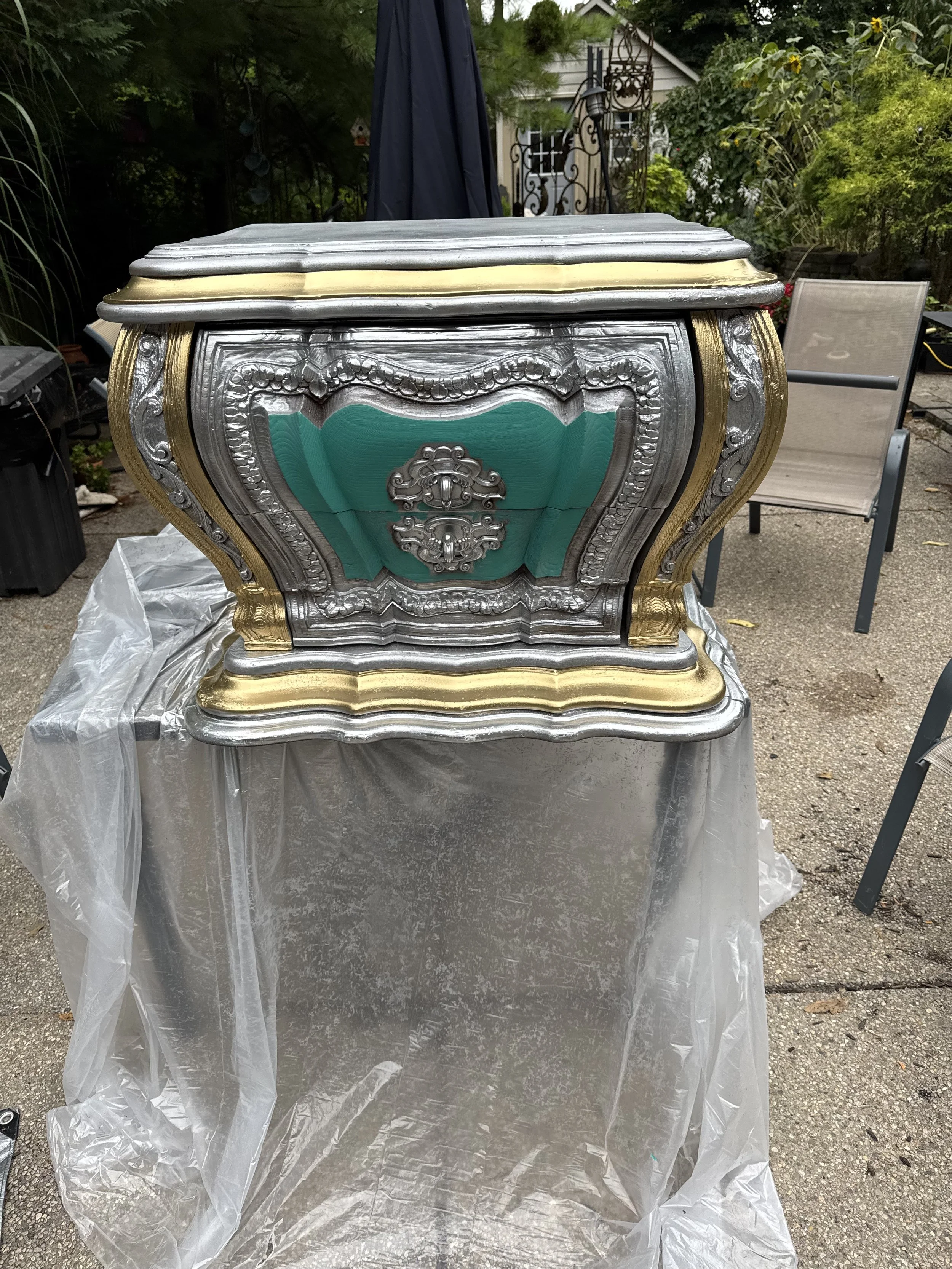 Green and gold Bombay chest
