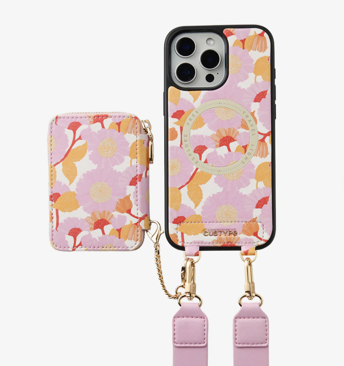 Pink floral-patterned phone case with attached chain and a matching card holder, holding a smartphone with a similar floral design on the back.