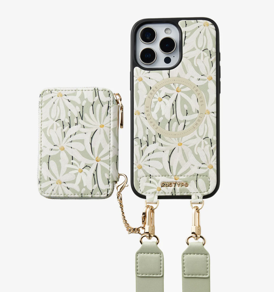 Phone case with a matching card holder, both featuring a white and green daisy floral pattern, with gold accents and attached straps.