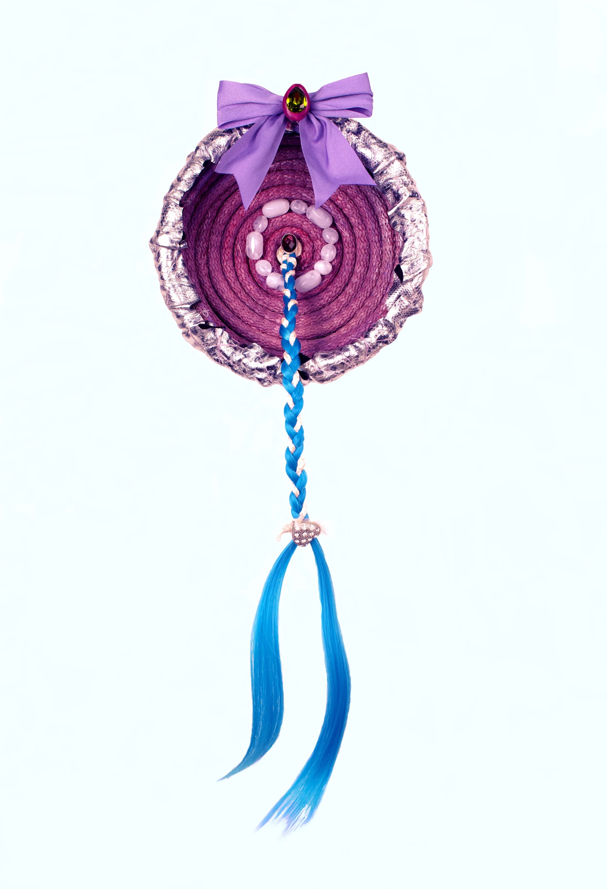 Simone | 2025 | Synthetic hair, rope, acrylic paint, found adornments, leather, thread, epoxy, super glue, metal, ribbons, gems | 17" x 8" x 6"