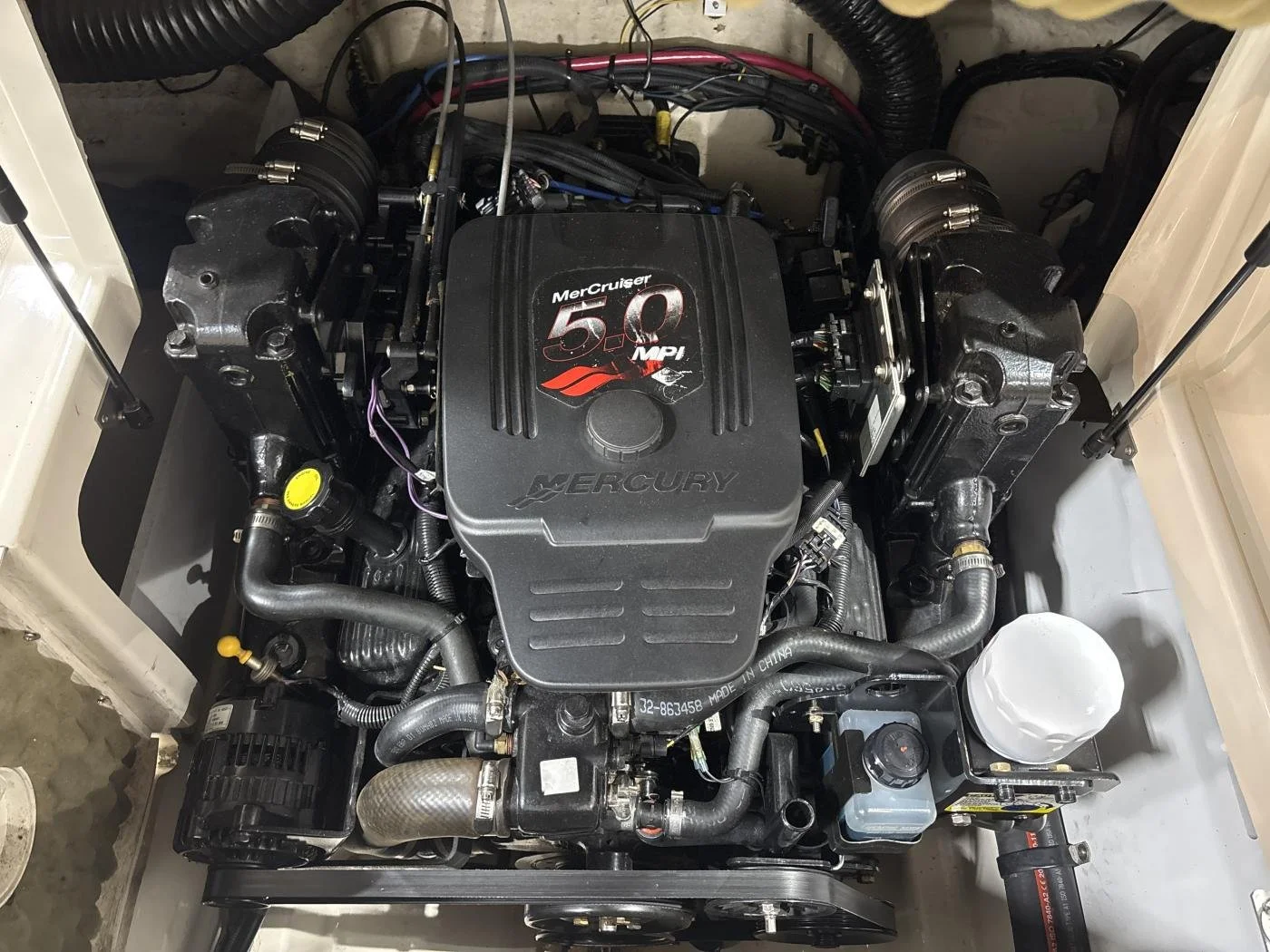 Mercury MerCruiser 5.0 MPI inboard marine engine installed in a boat engine compartment