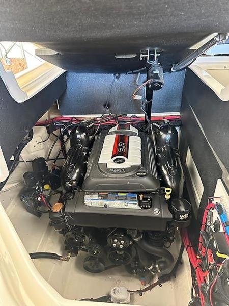 Boat engine compartment with a Mercury 350 Magnum outboard engine on a Sea Ray 280 SLX.