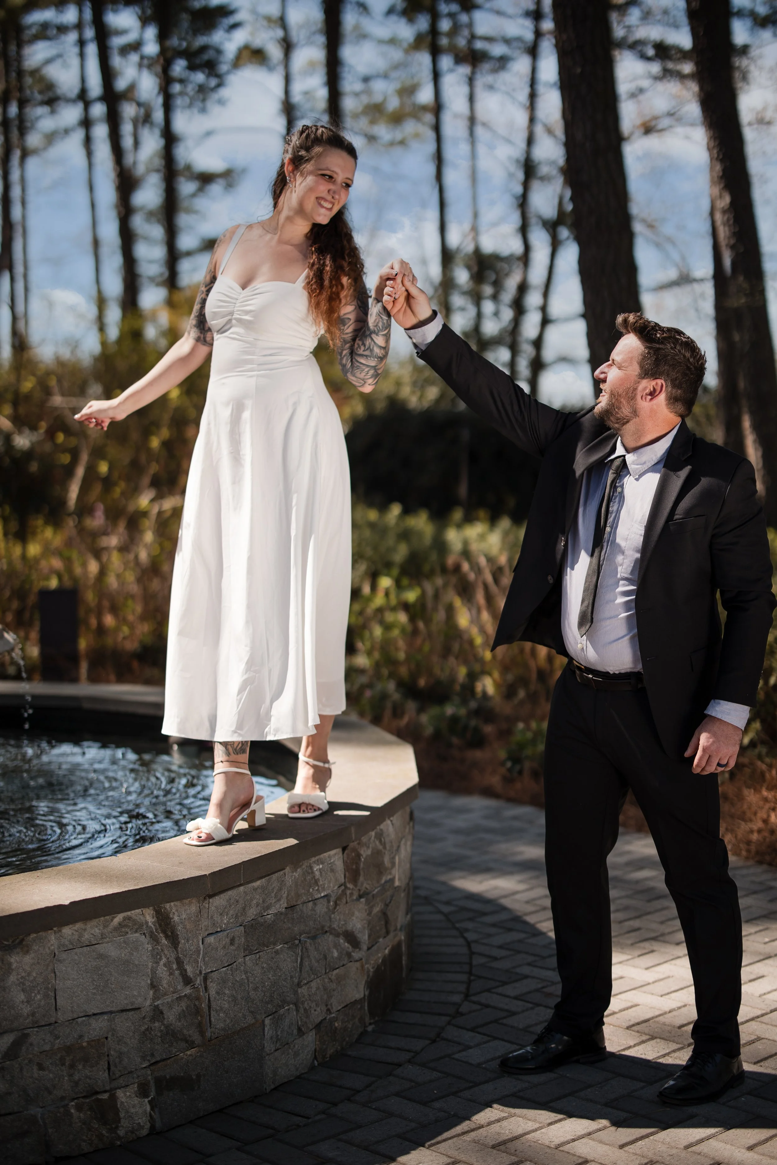 couple pre-elopement photos garden fountain
