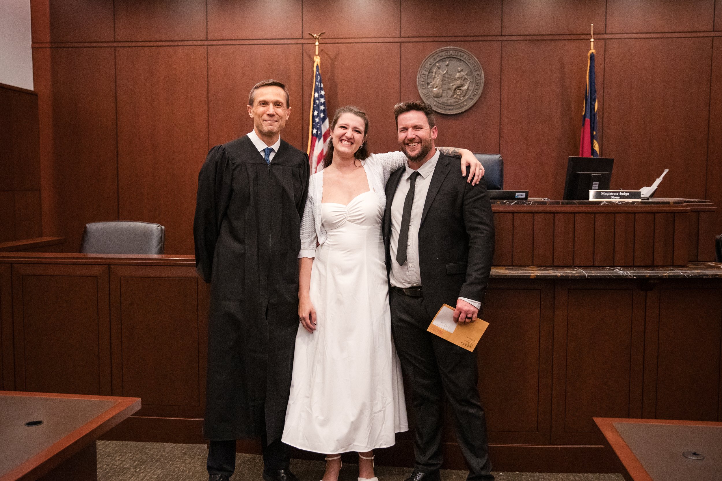 Couple after ceremony Raleigh courthouse room 9