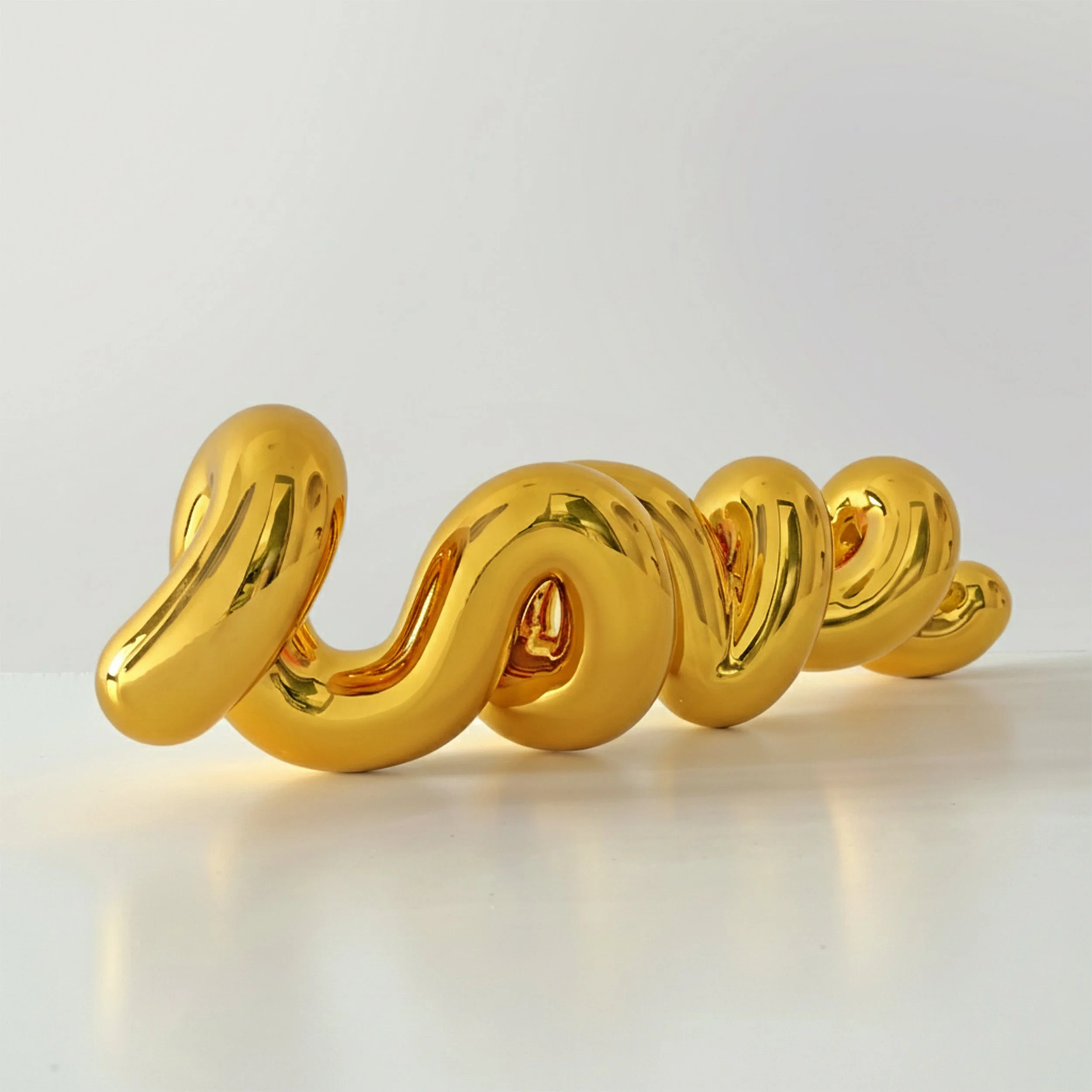 Yoni Alter   Love Continuum   Platinum Plated Stainless Steel Sculpture   2026   7.9 x 26.7 x 6.25 Inches (20 x 68 x 16 cm)   Limited Edition of 6 works   Signed, dated, and embossed studio certificate included to maintain the work’s seamless form.  