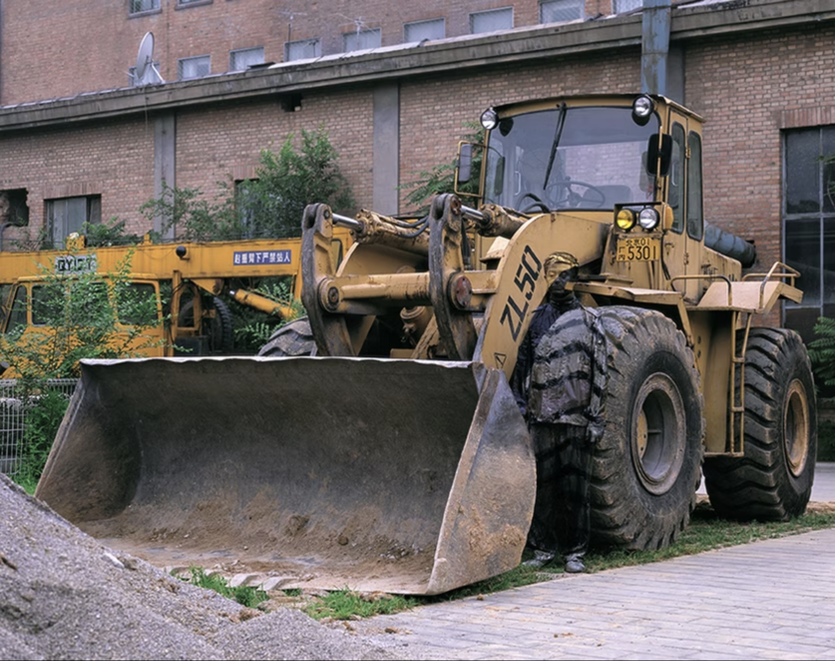 Liu Bolin Bulldozer Archival Pigment Print 2008 Sheet Size 47.25 x 59 Inches (120 x 150 cm) Limited Edition of 8 works Signed and Numbered