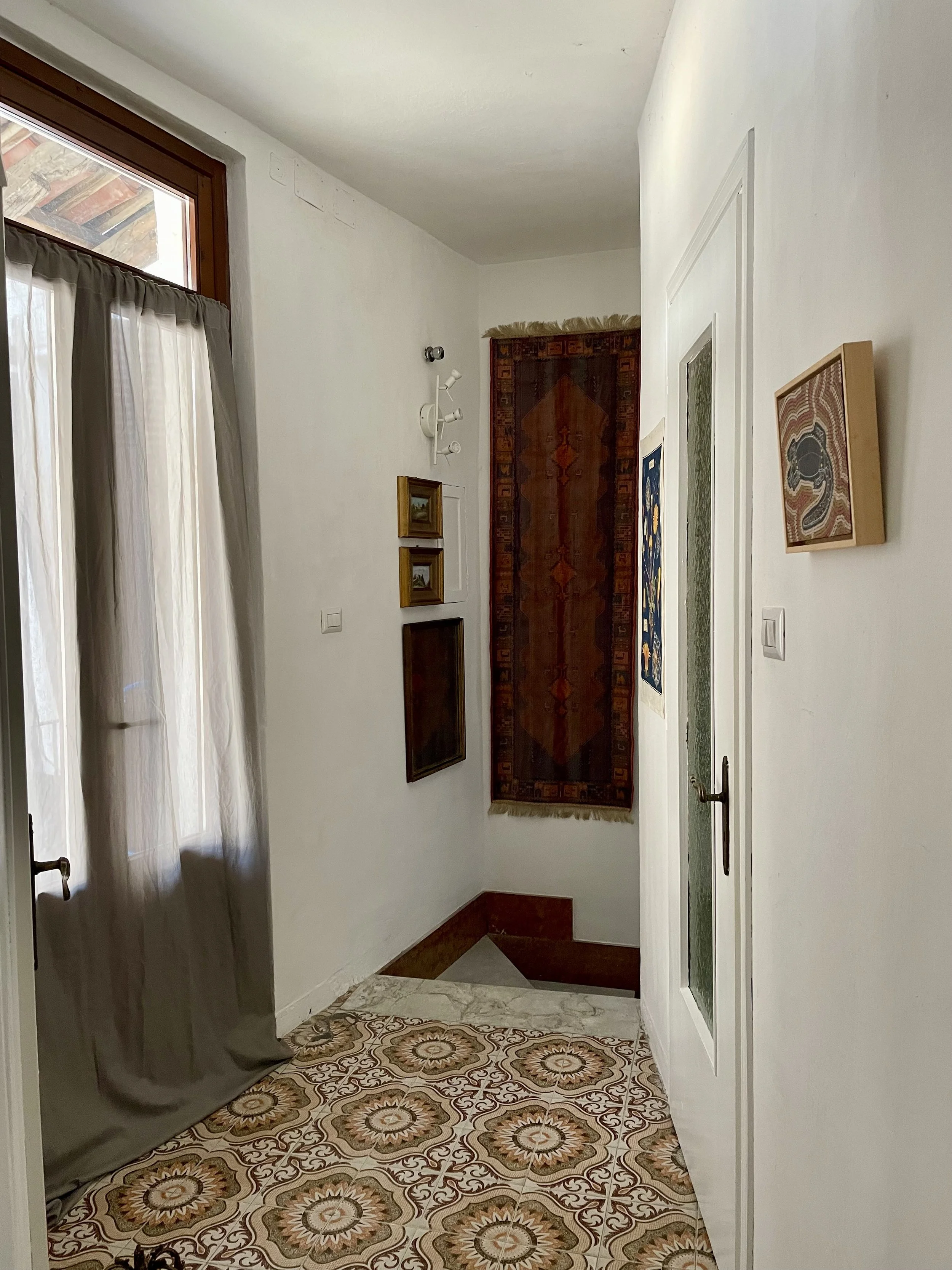 Interior designers holiday apartment in the historic centre of Pinerolo Northern Italy For sale. Close to Turin, Alps for skiing and cycling. Comes with Bike storage and all furniture and styling included.