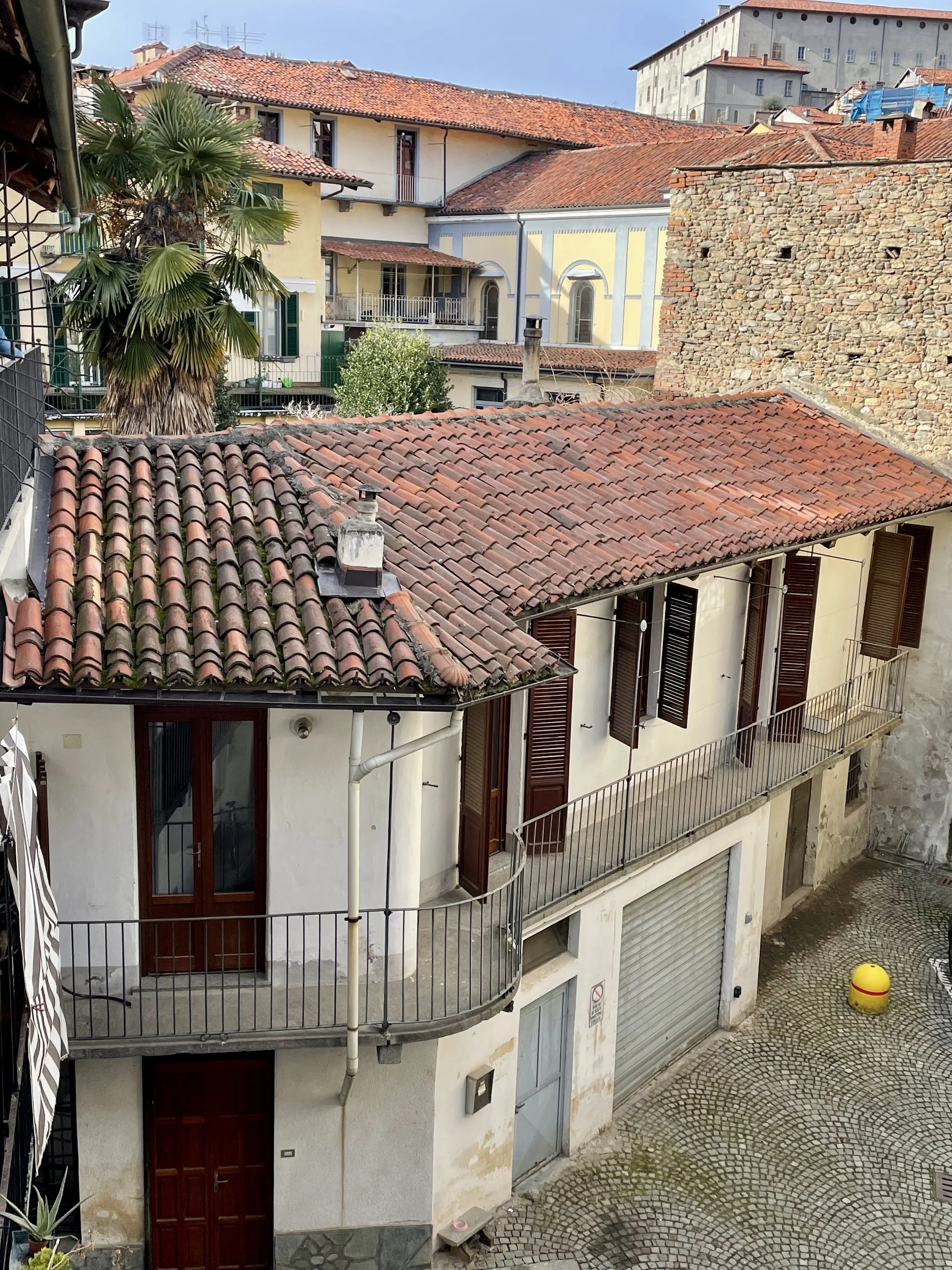 Interior designers holiday apartment in the historic centre of Pinerolo Northern Italy For sale. Close to Turin, Alps for skiing and cycling. Comes with Bike storage and all furniture and styling included.