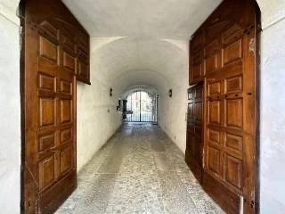 Interior designers holiday apartment in the historic centre of Pinerolo Northern Italy For sale. Close to Turin, Alps for skiing and cycling. Comes with Bike storage and all furniture and styling included.
