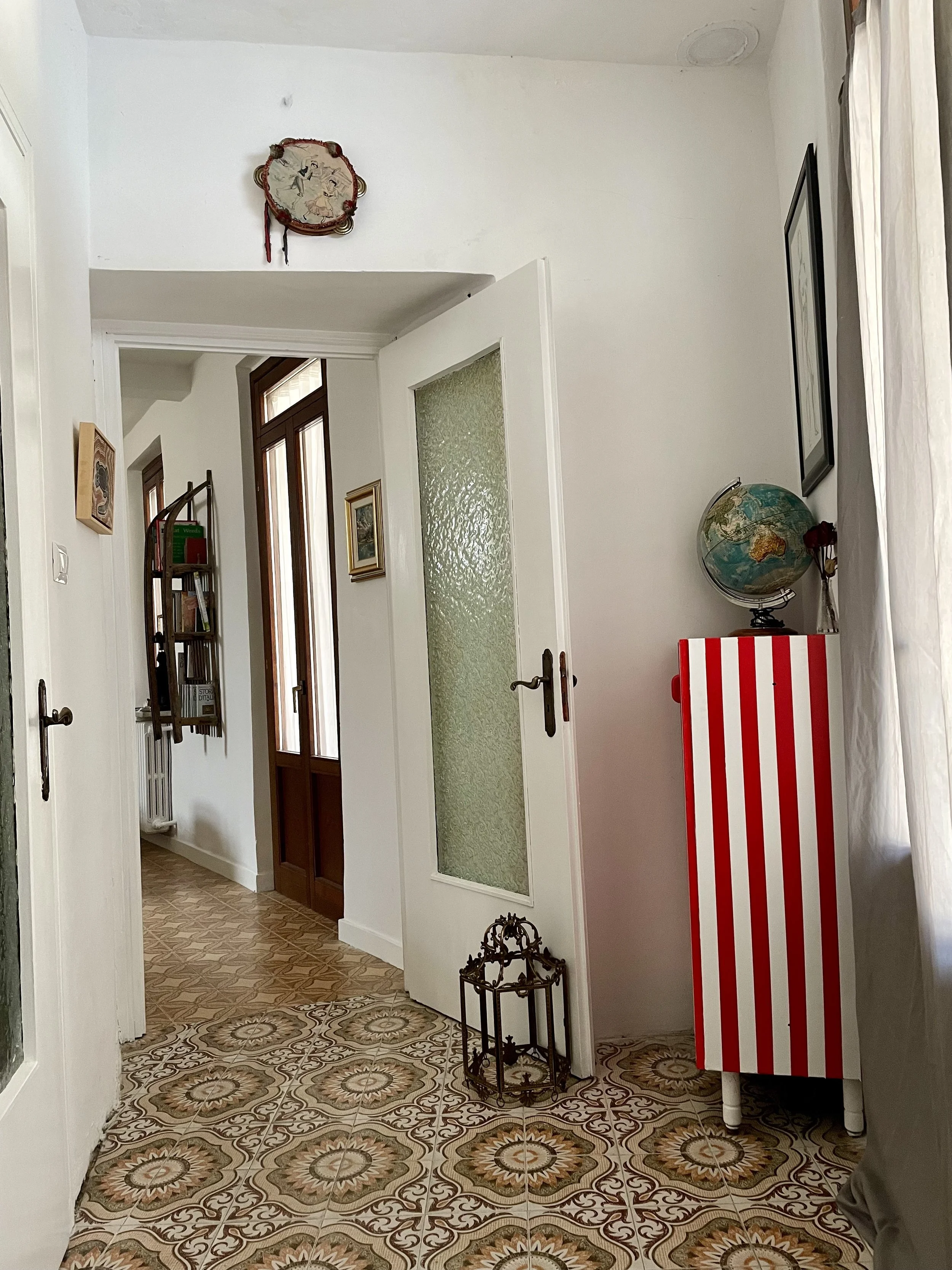 Interior designers holiday apartment in the historic centre of Pinerolo Northern Italy For sale. Close to Turin, Alps for skiing and cycling. Comes with Bike storage and all furniture and styling included.