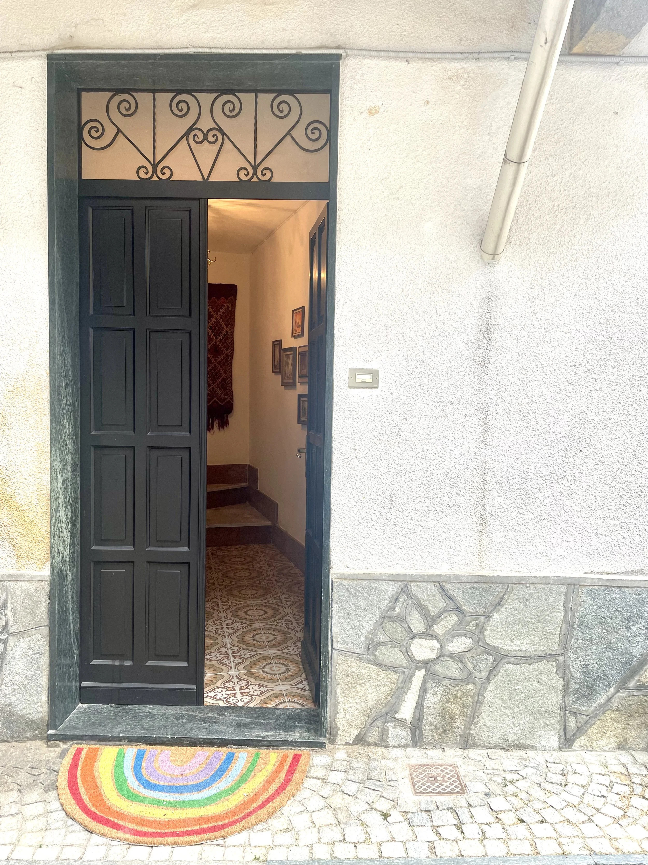 Interior designers holiday apartment in the historic centre of Pinerolo Northern Italy For sale. Close to Turin, Alps for skiing and cycling. Comes with Bike storage and all furniture and styling included.