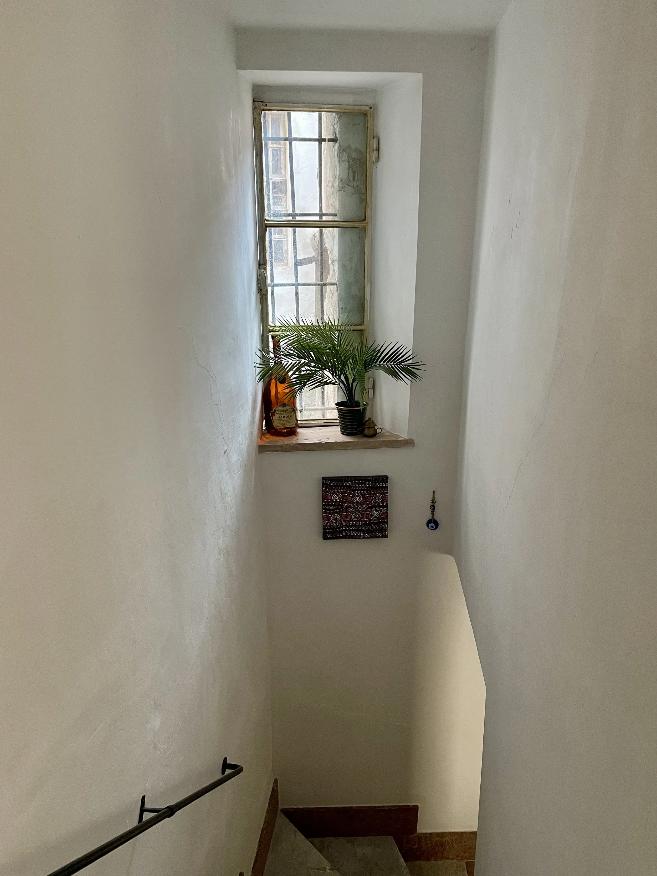 Interior designers holiday apartment in the historic centre of Pinerolo Northern Italy For sale. Close to Turin, Alps for skiing and cycling. Comes with Bike storage and all furniture and styling included.