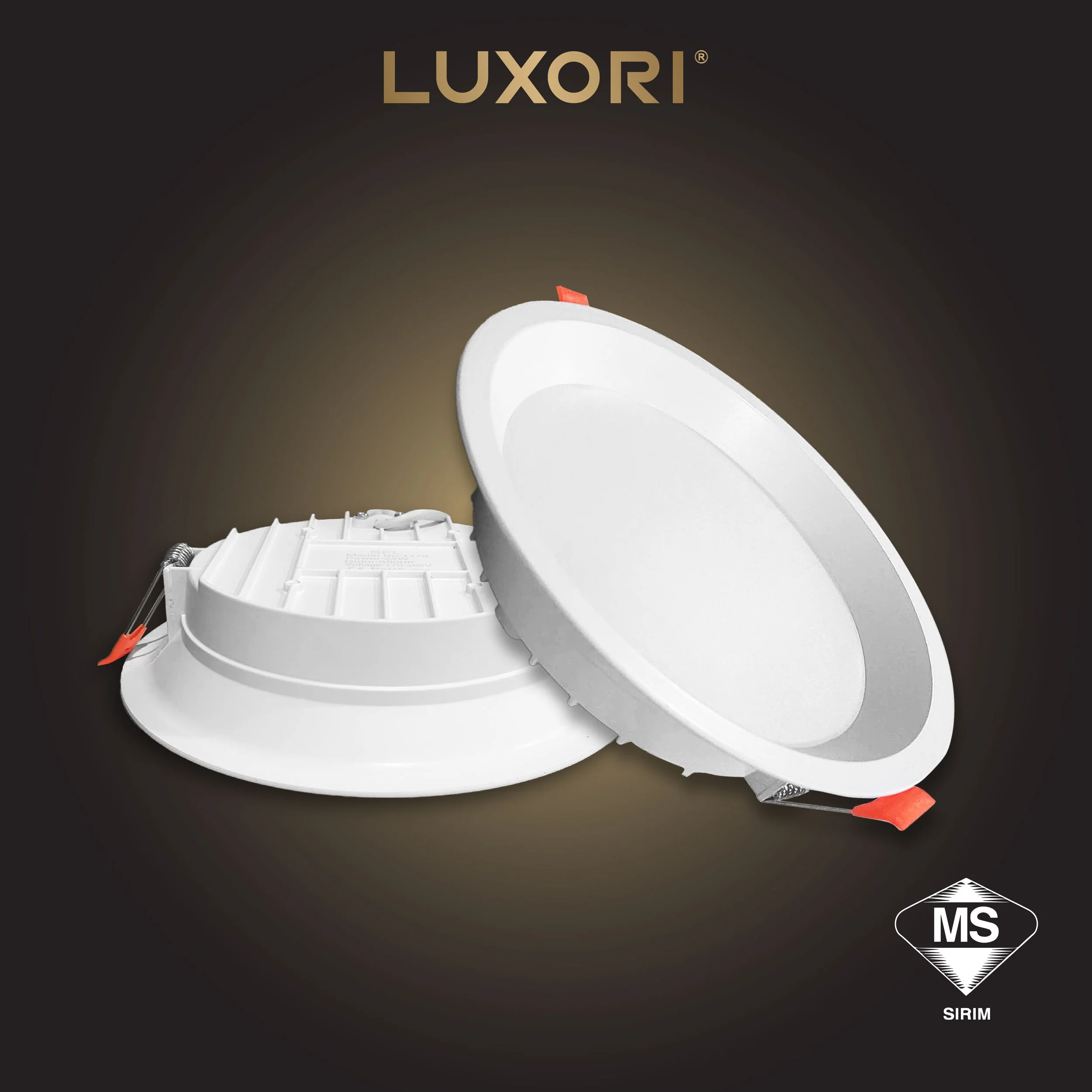 Photo of a recessed ceiling light fixture with the trim and housing visible and labeled 'LUXORI' against a dark background.