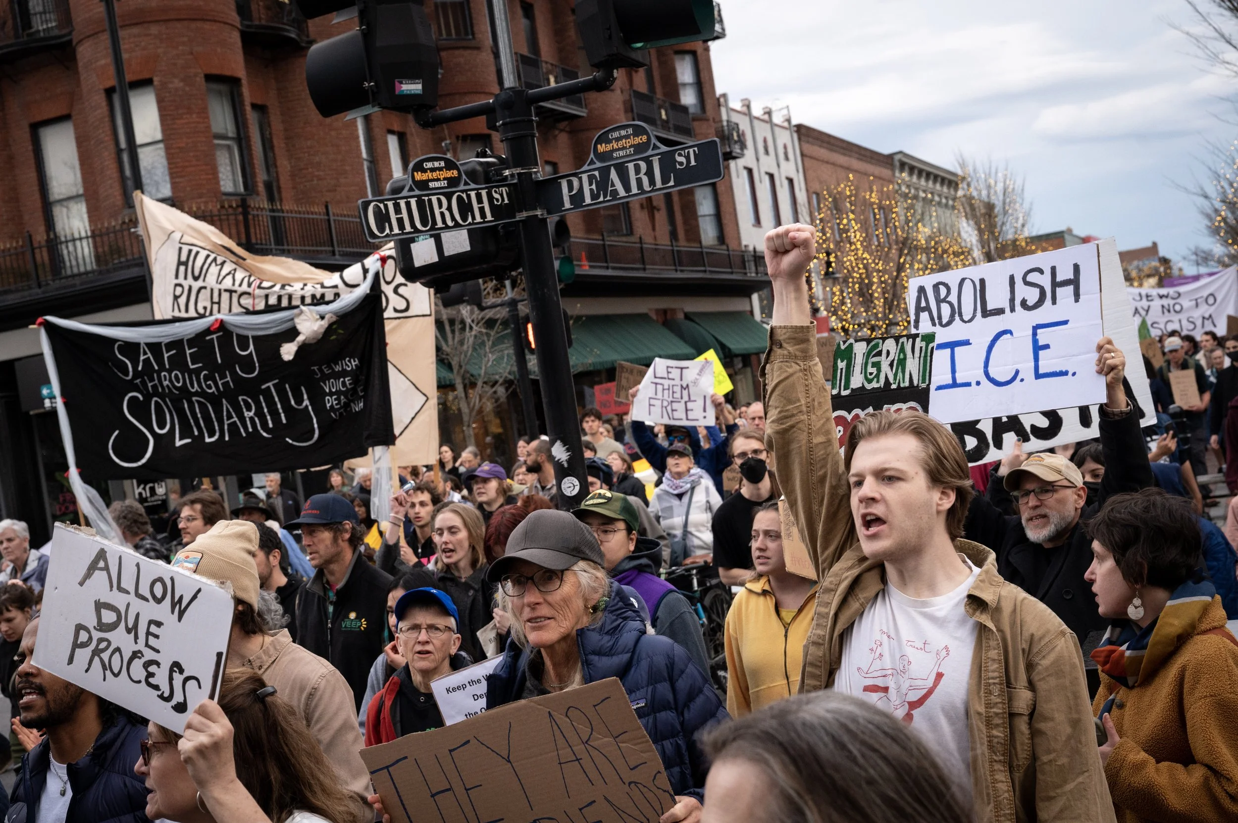 People march in a protest organized by the group Migrant Justice, to protest the detention of eight dairy farm workers days earlier, on April 24, 2025, on Church Street in Burlington, Vermont. 