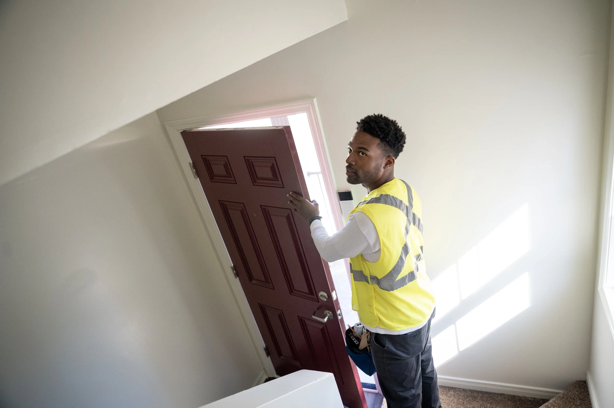 Kevin Dunn leaves a Church of the Messiah-owned property where he was working to install free wifi service  on October 9, 2025, in Detroit, Michigan. Dunn is a digital steward with Church of the Messiah’s Equitable Internet Initiative, meaning he is 