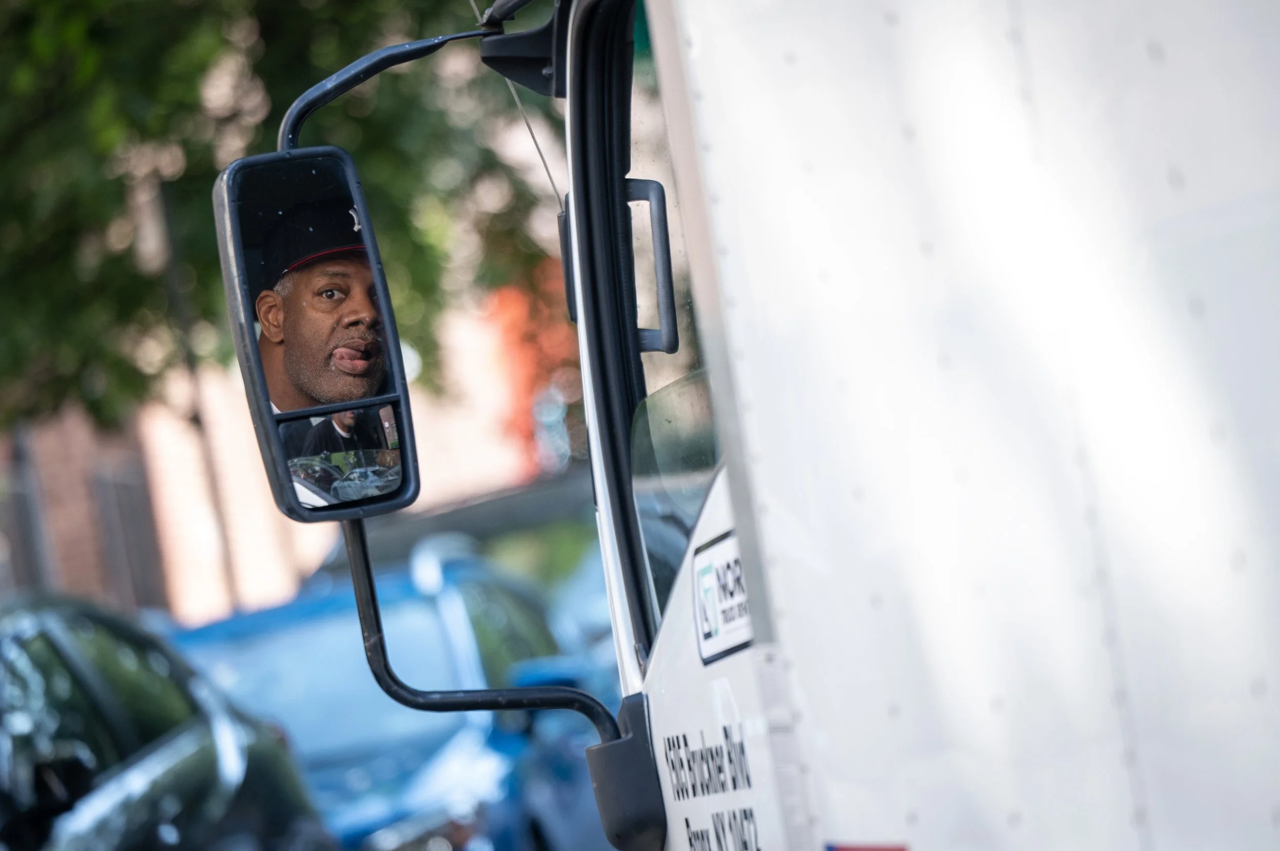 Adonis Williams parks his truck outside a moving job September 3, 2025, in Queens, New York. Williams, who has been in the moving business for 23 years, helps people escaping domestic violence move their belongings for free.
