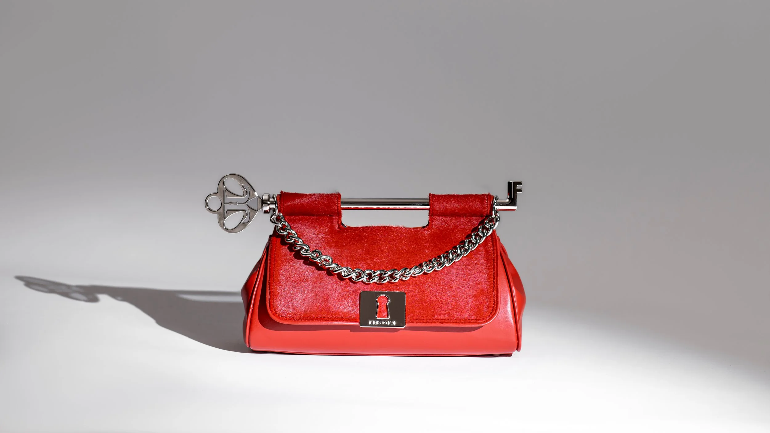 Legacy Clutch - Red Cavallino