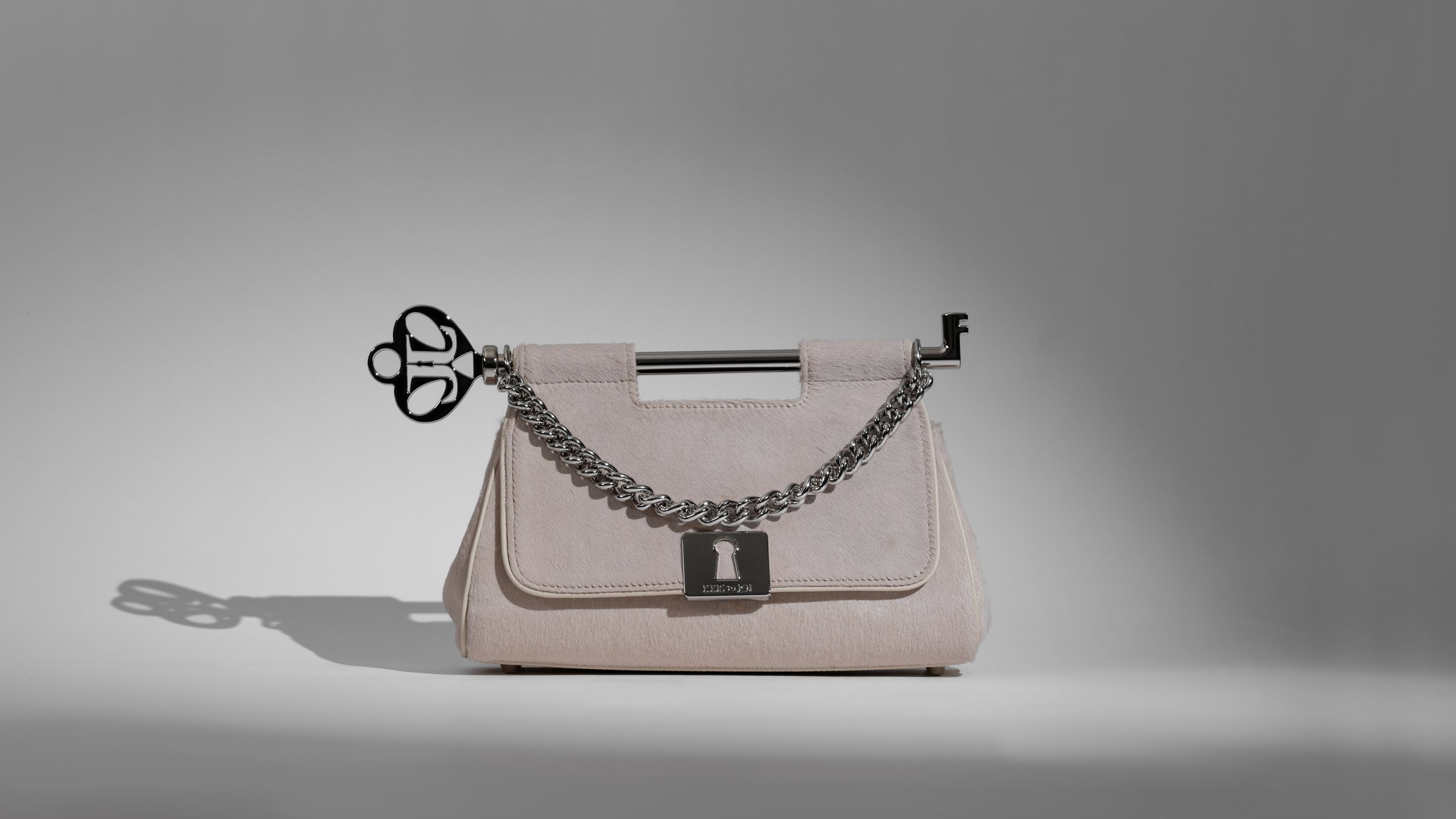 Legacy Clutch - Warm Vanilla Cavallino