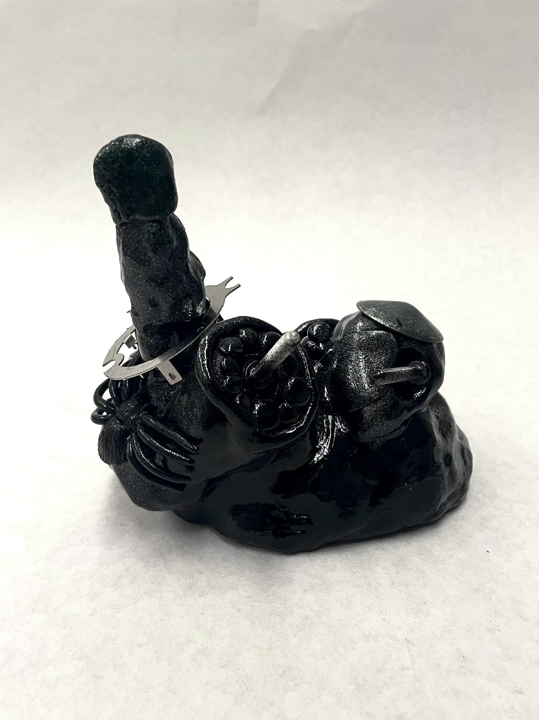 "untitled black heap"
ceramic, spray paint, found objects, spray lacquer, 6", 5.5"x5.5"