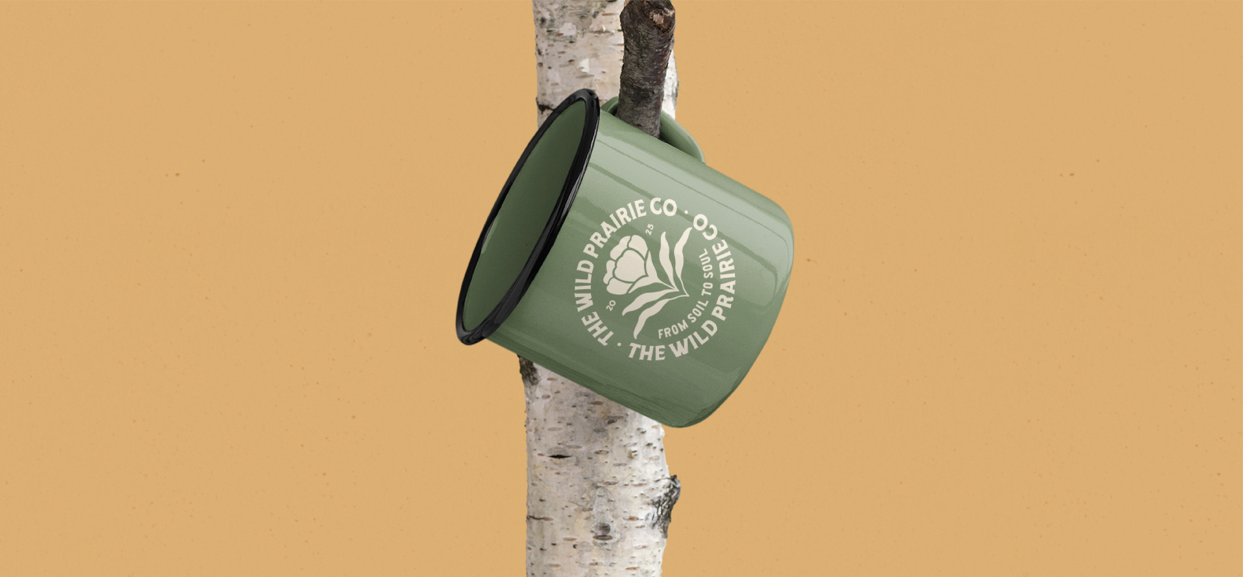 Wild Prairie Co. Mug hanging from tree