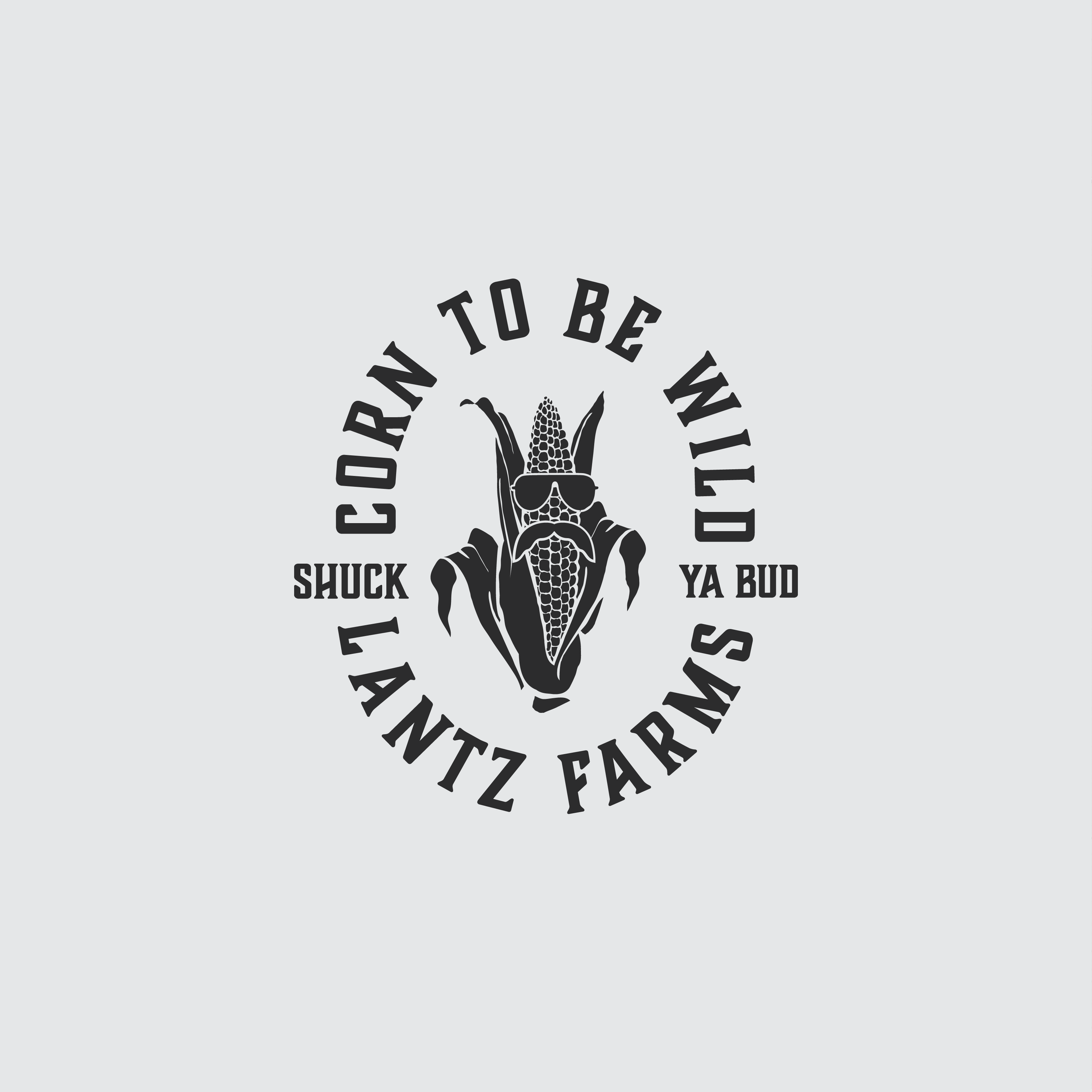 A stylized black and white illustration of a corn cob with sunglasses, surrounded by the text "Born to be Wild" and "Landz Farms," with the phrase "Shuck Ya Bud" incorporated into the design.