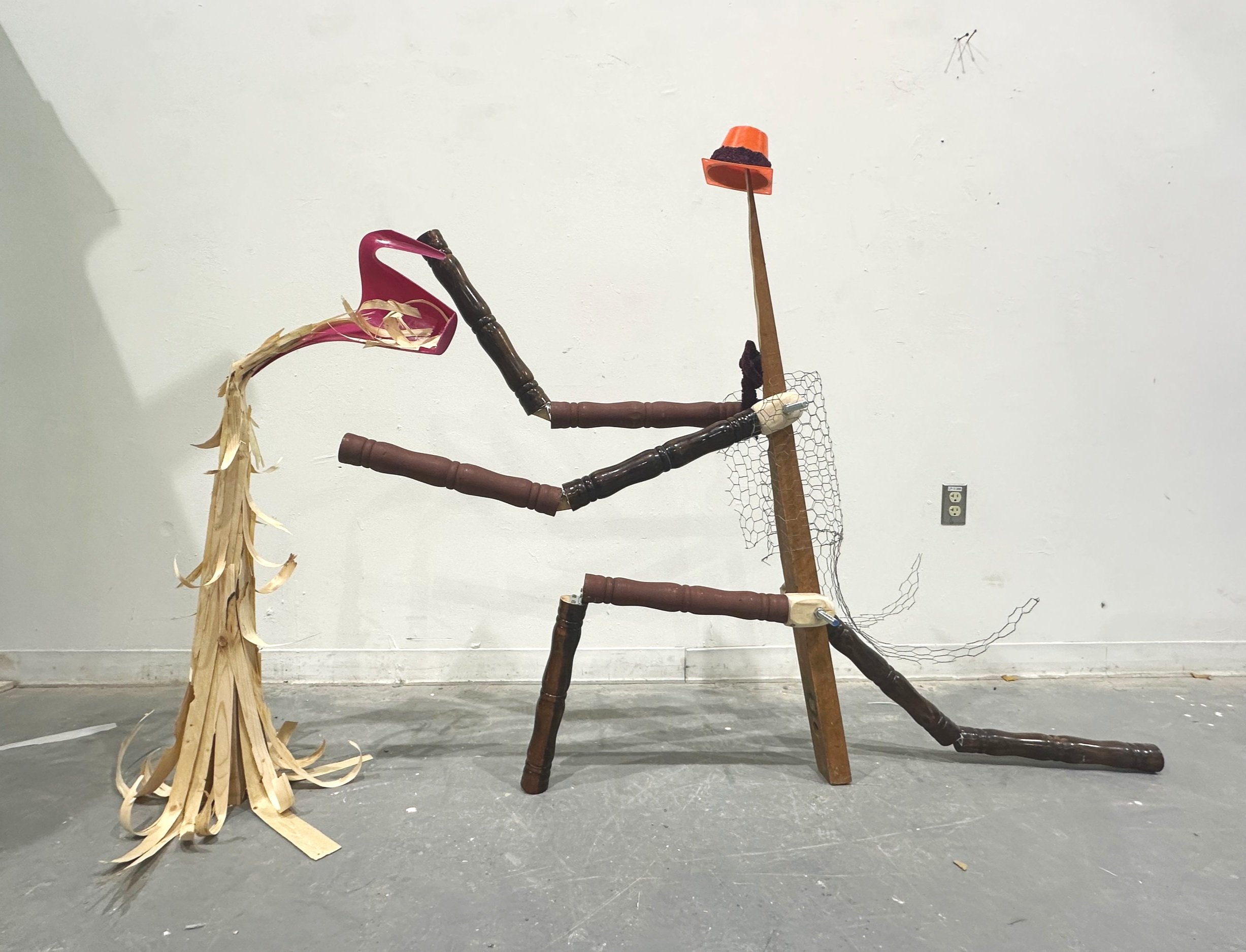 Dapper Man: 51in x 52in x 13in (wood, chicken wire, plastic, fabric)
