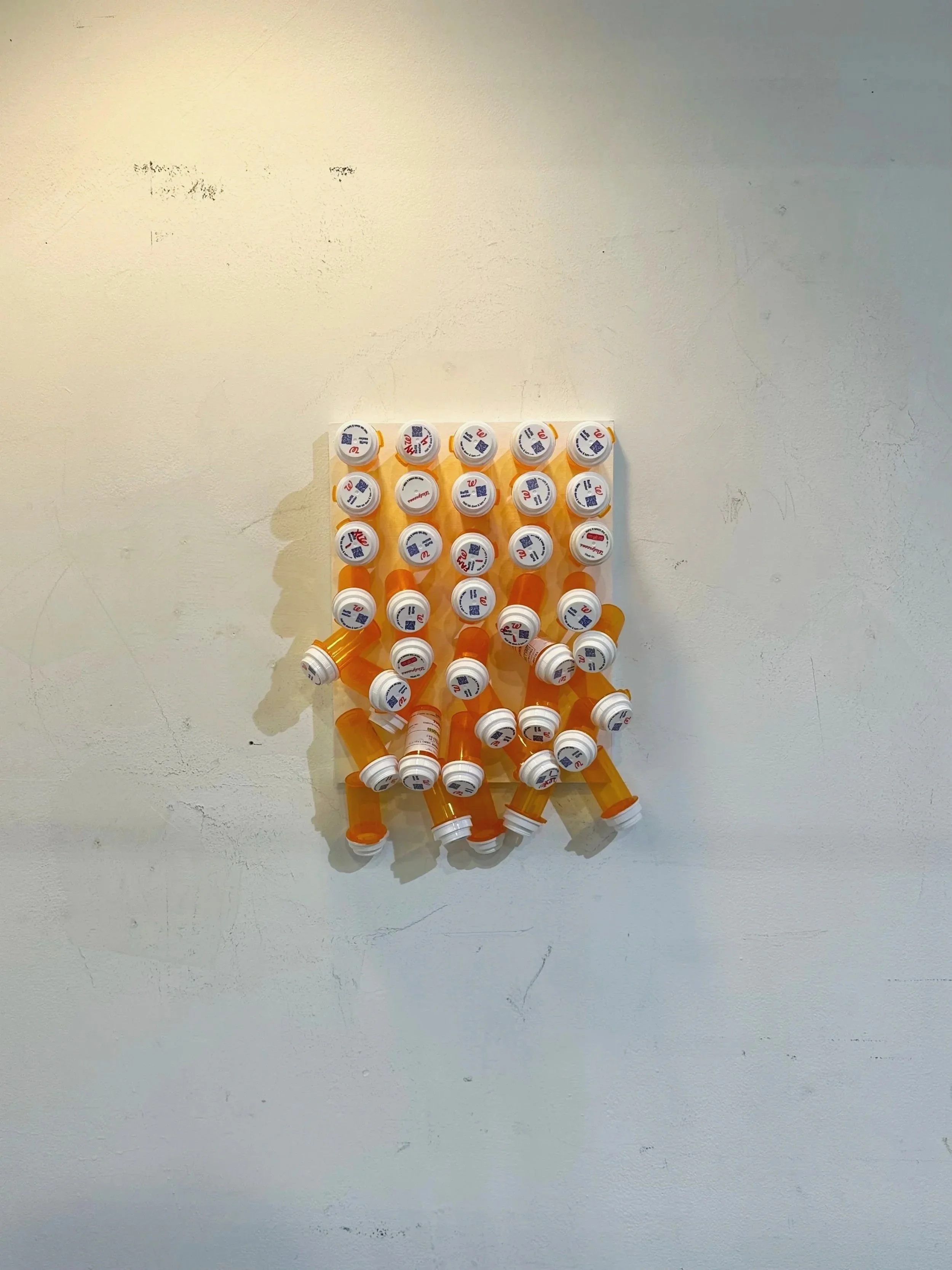 Breakdown: (pill bottles, wood panel, acrylic paint)