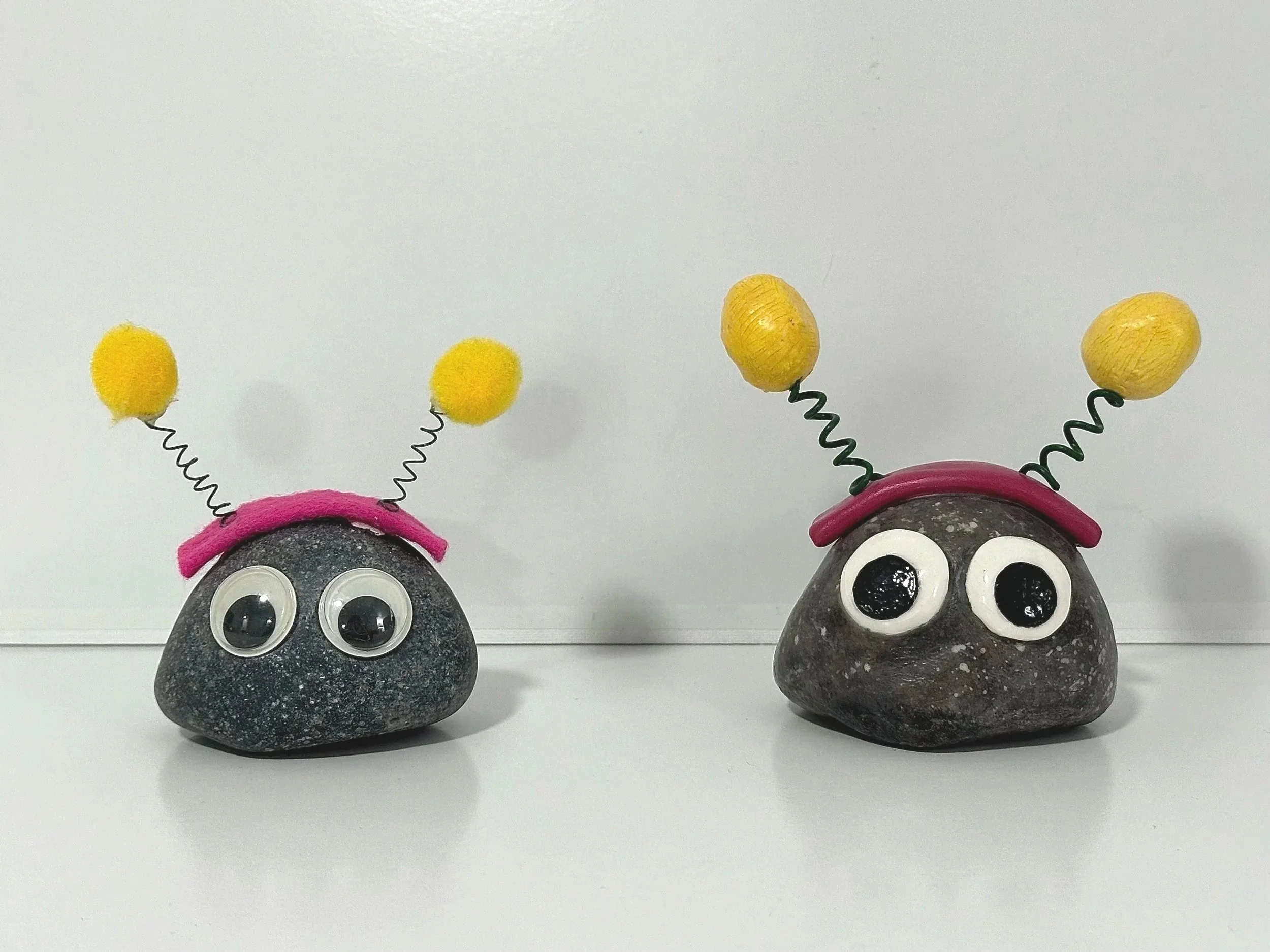 Replicate (Lemon) (Left: rock, felt, googly eyes, wire, puff balls, cotton ball / Right: ceramic clay, underglaze, acrylic paint, wire)