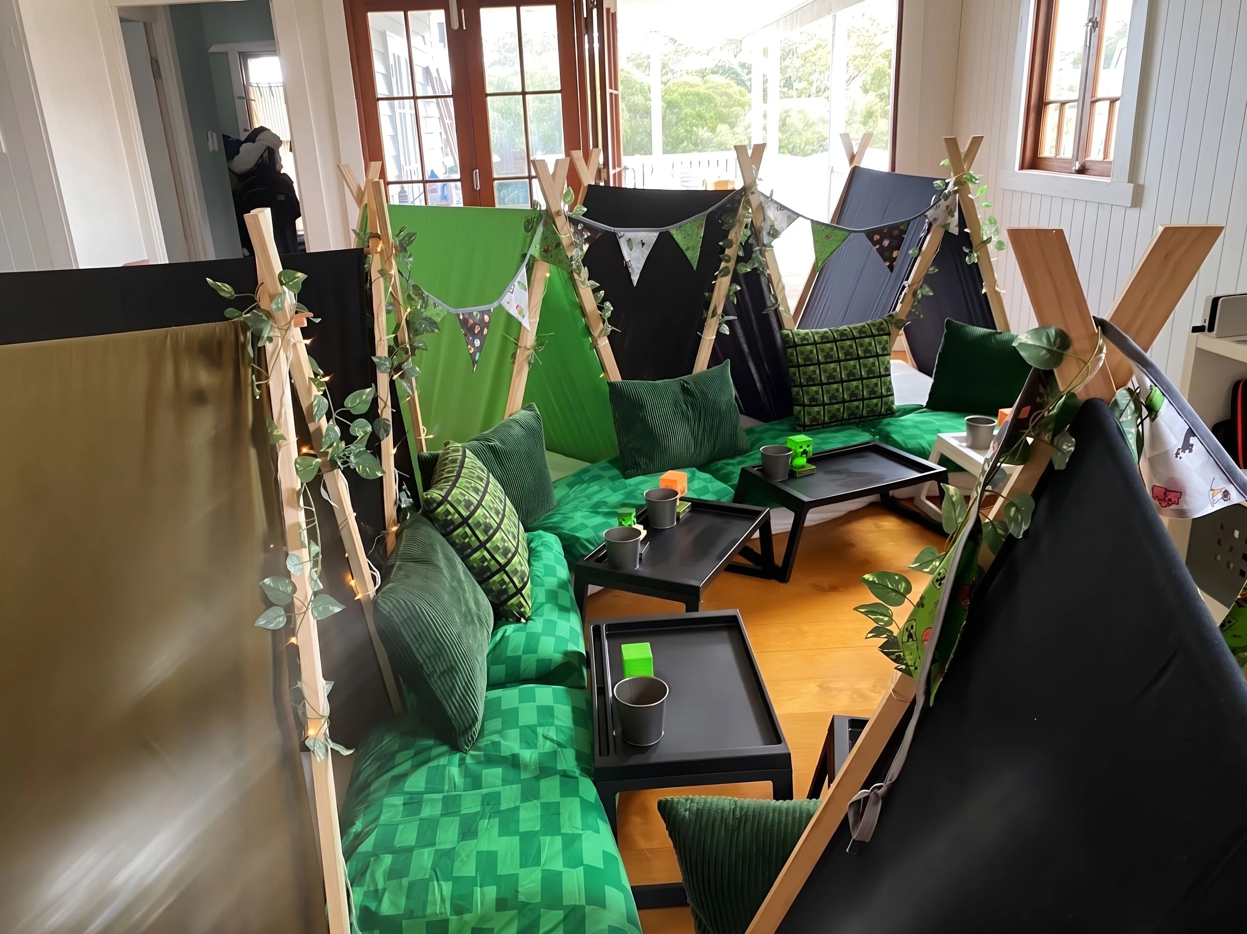 Minecraft themed teepee sleepover setup for kids.